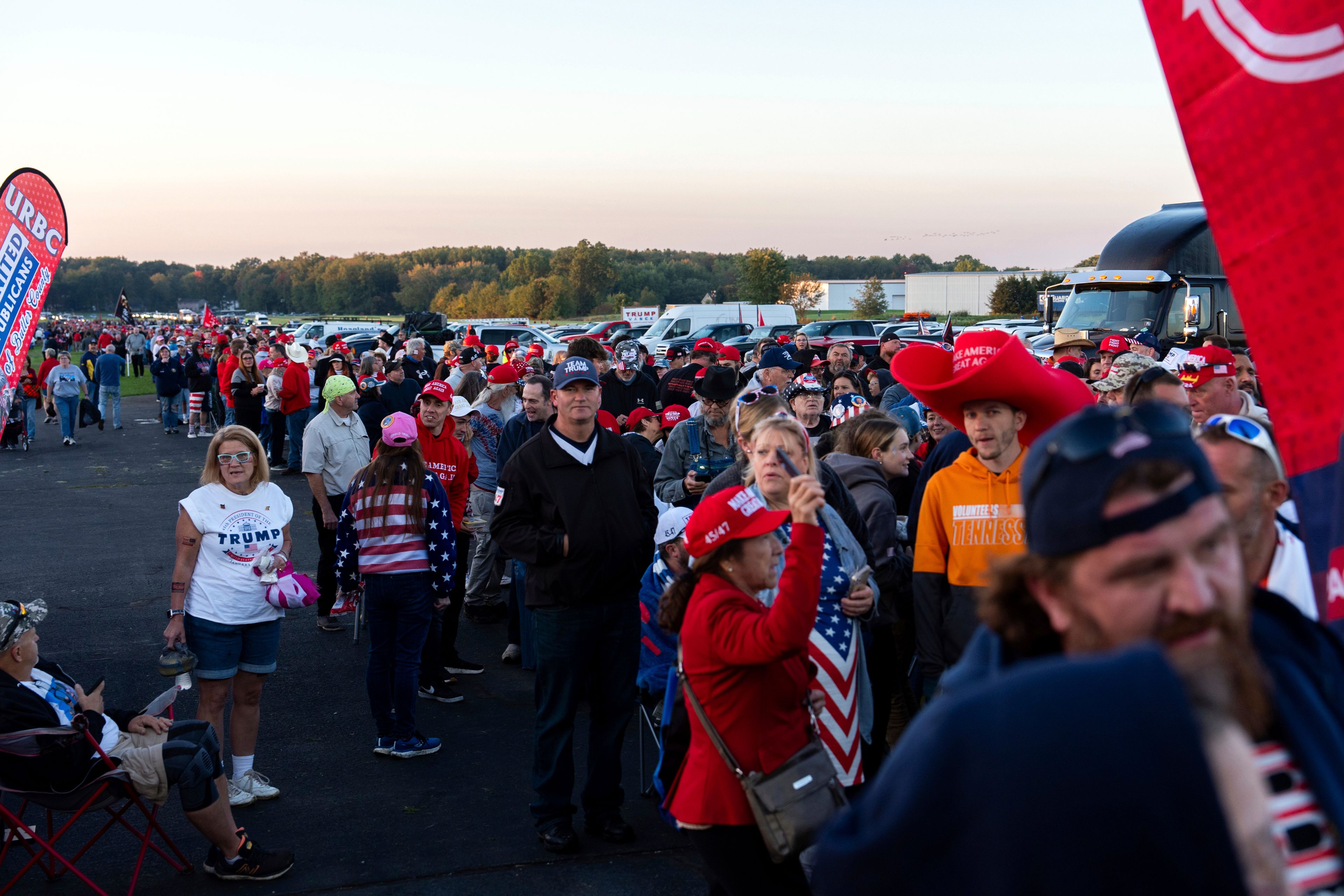 Supporters of Republican presidential nominee former President Donald Trump wait to enter a campaign rally at the Butler Farm Show, Saturday, Oct. 5, 2024, in Butler, Pa. (AP Photo/Julia Demaree Nikhinson)