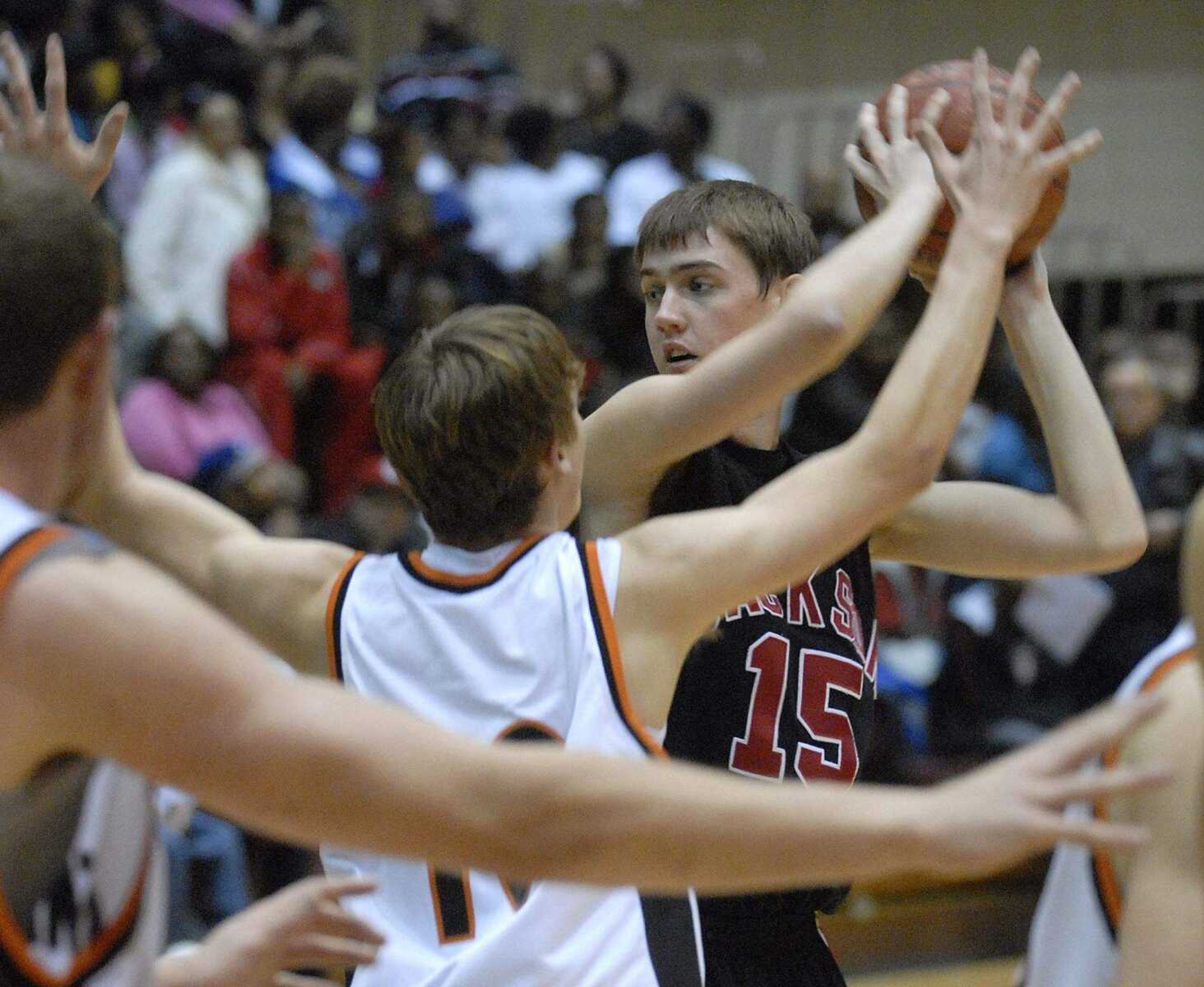 FRED LYNCH ~ flynch@semissourian.com
Jackson's Cody Green looks to pass against Central in the third quarter at the SEMO Conference tournament in Sikeston.