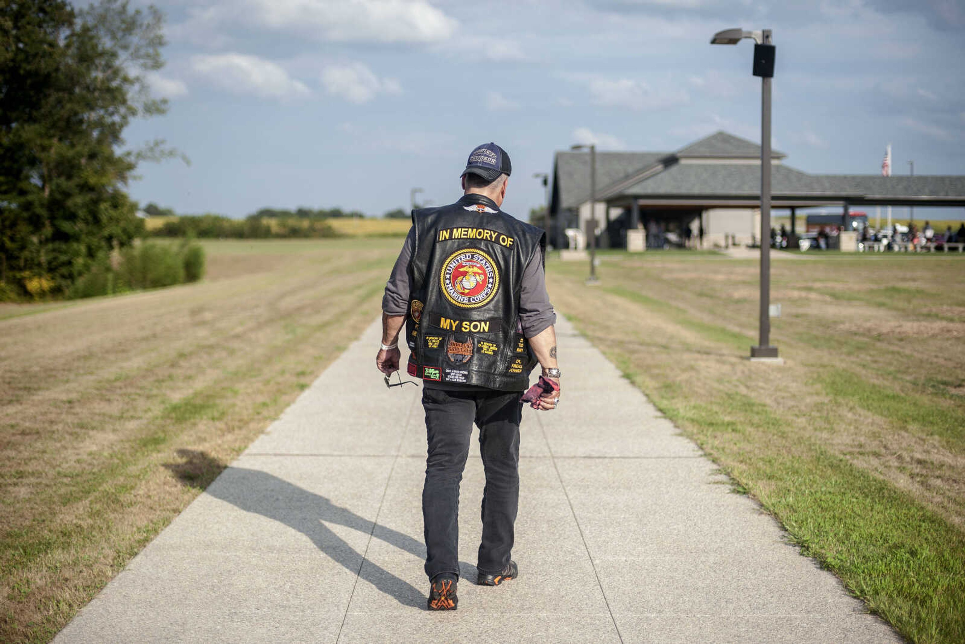 Bob Davis of Willard, Missouri, is seen after the first-ever Missouri Vietnam Wall Run  Saturday, Sept. 21, 2019, at the Missouri's National Veterans Memorial in Perryville. Davis's vest patches are references to his late son, Cpl. Kindall Johnson.