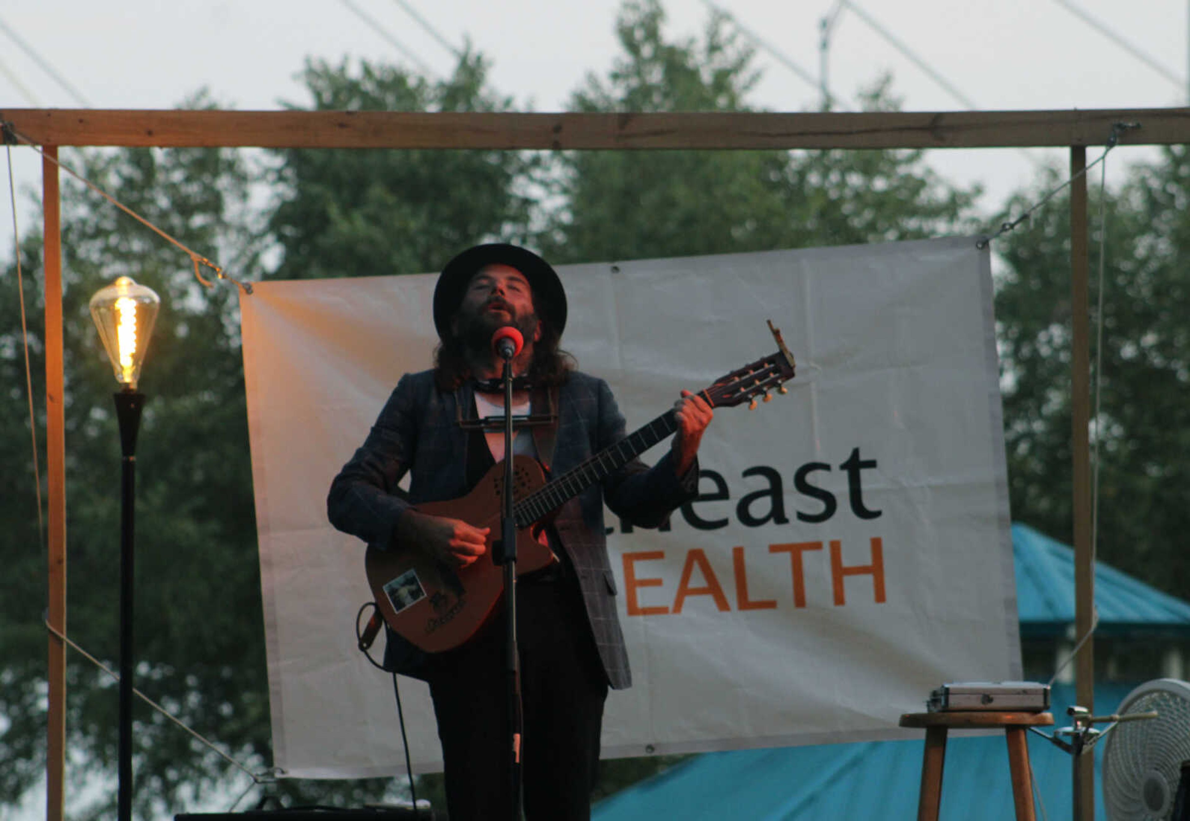 Carl Banks, a blues, roots and folk rock musician from New York, New York, performs during Tunes at Twilight Friday, Sept. 3, 2021, at River Campus Park, located at the intersection of South Spanish and Morgan Oak streets.&nbsp;