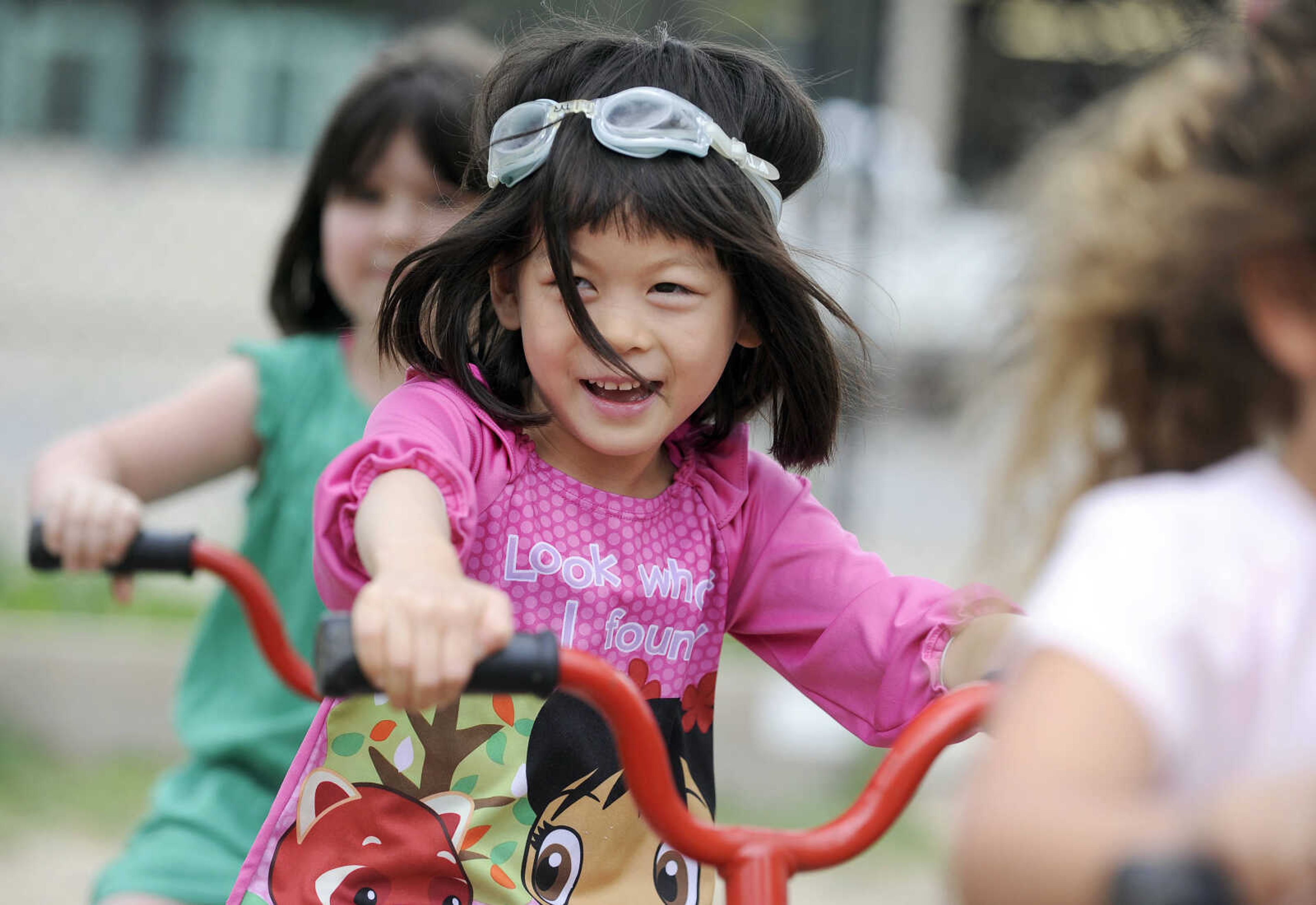 LAURA SIMON ~ lsimon@semissourian.com

Amelia Peng rides a tricycle around the playground at Southeast Missouri State University's University School for Young Children on Monday afternoon, May 9, 2016, in Cape Girardeau.