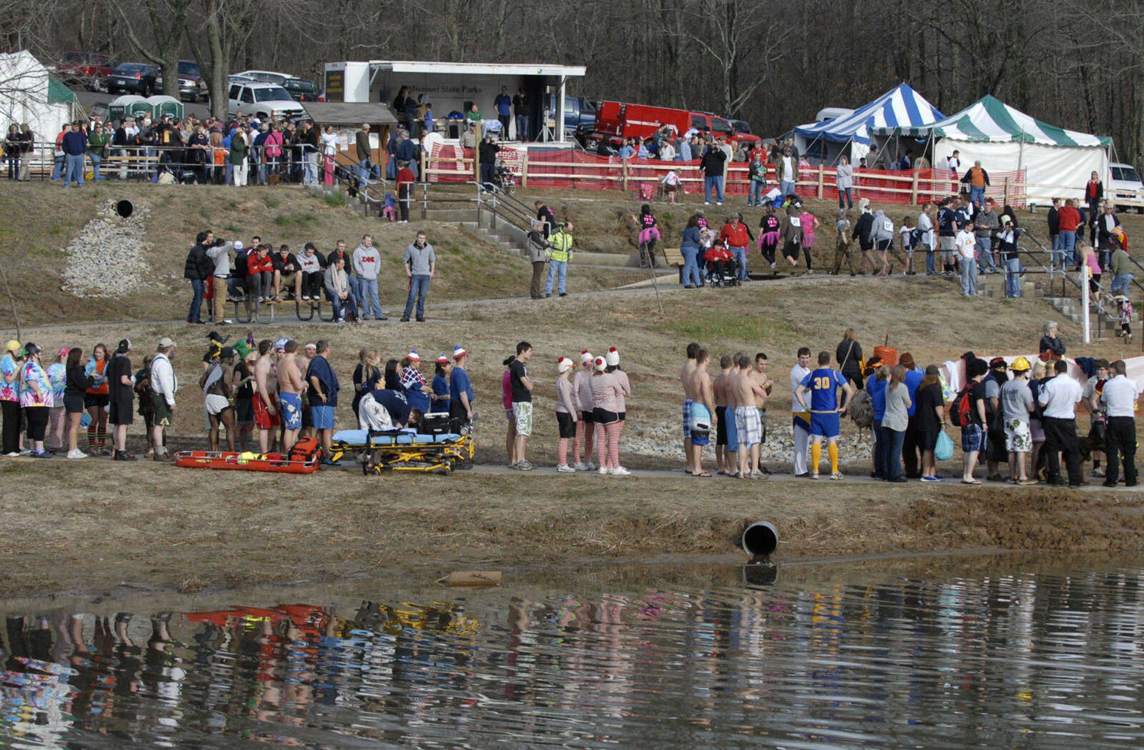 KRISTIN EBERTS ~ keberts@semissourian.com

Plungers line up to wait their turn during the 2012 Polar Plunge at the Trail of Tears State Park's Lake Boutin on Saturday, Feb. 4, 2012.