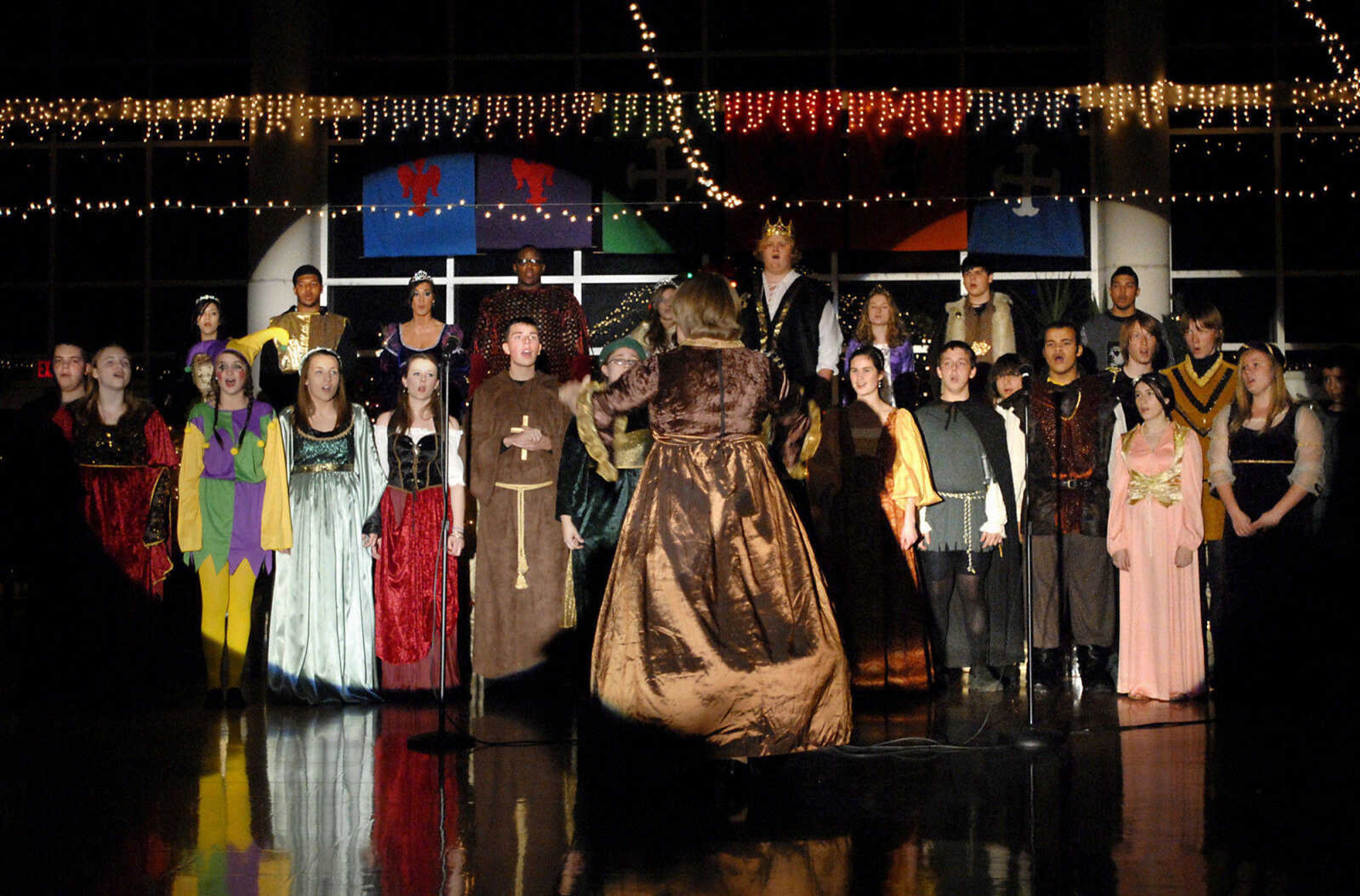 KRISTIN EBERTS ~ keberts@semissourian.com

Students perform a song during the Central High School Choral Department's "Ye Olde Yuletide Madrigal Feaste," on Friday, Dec. 10, 2010, in Cape Girardeau. Students provided singing, food and entertainment as they transported guests back to Christmas in Renaissance England.