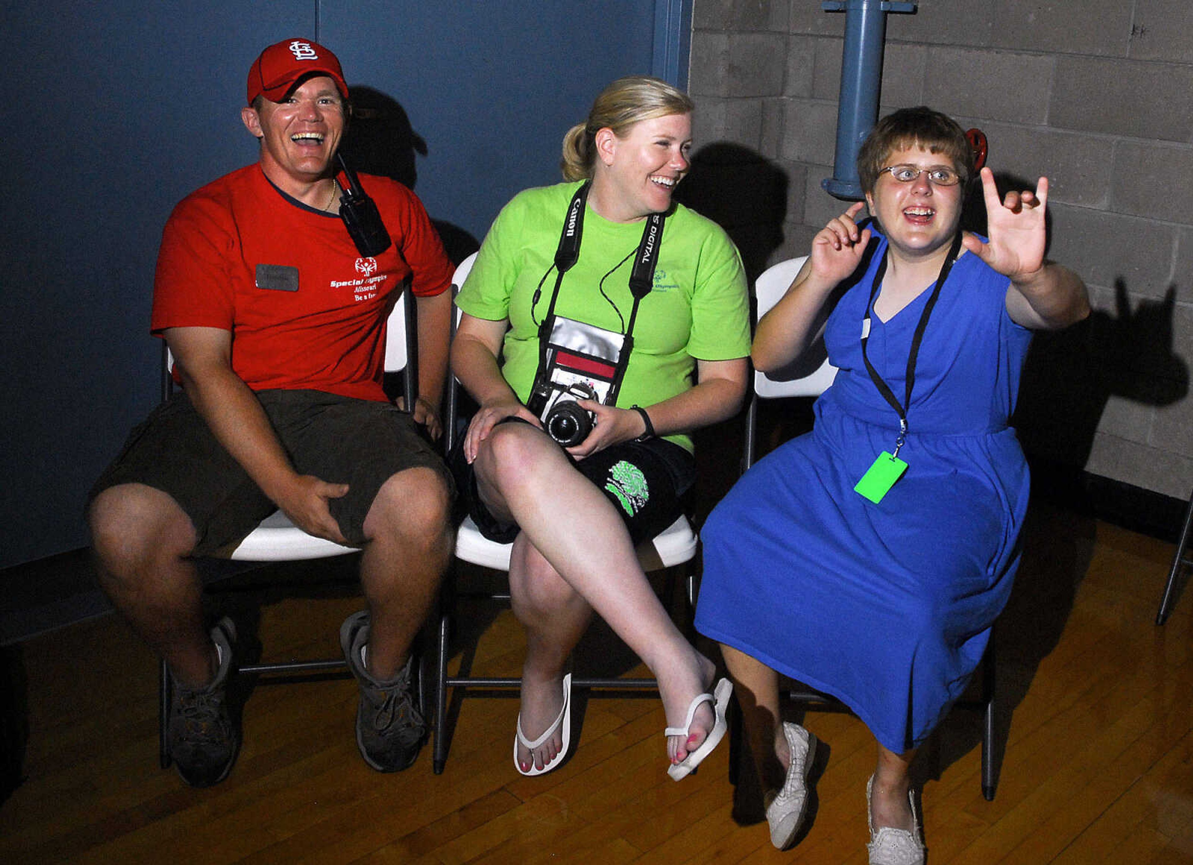 LAURA SIMON~lsimon@semissourian.com
Special Olympic Staff members Jeremie Ballinger, left, and Mandi Mueller visit with athlete Anastasia Culp Saturday, August 14, 2010 during the Special Olympics dance at Southeast Missouri State University's student Rec Center.