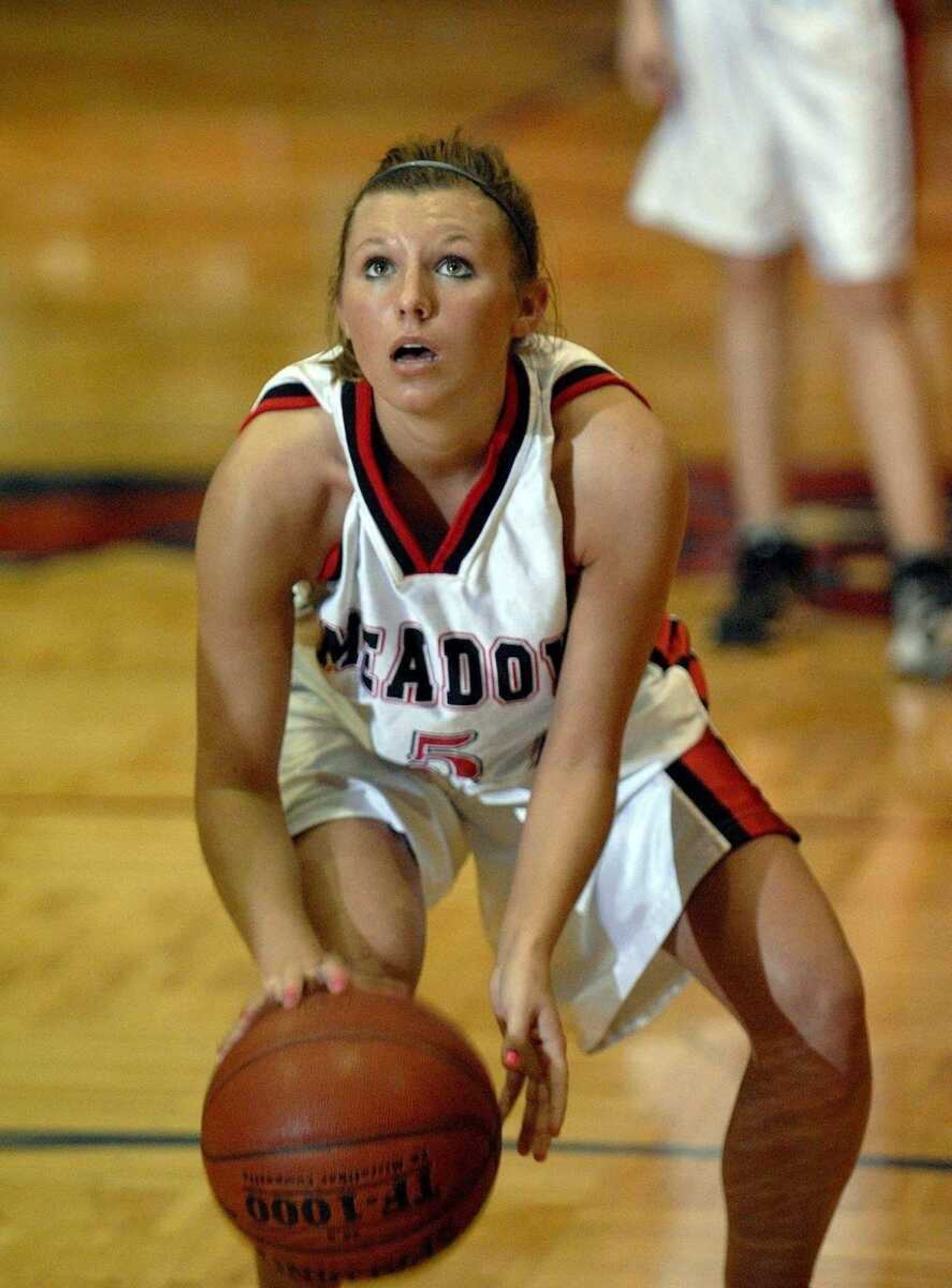 ELIZABETH DODD ~ edodd@semissourian.comMeadow Heights' Ashley Doublin prepares to shoot a free throws during the final minutes of the Panthers' victory over Bismarck in a Class 2 sectional game Wednesday.