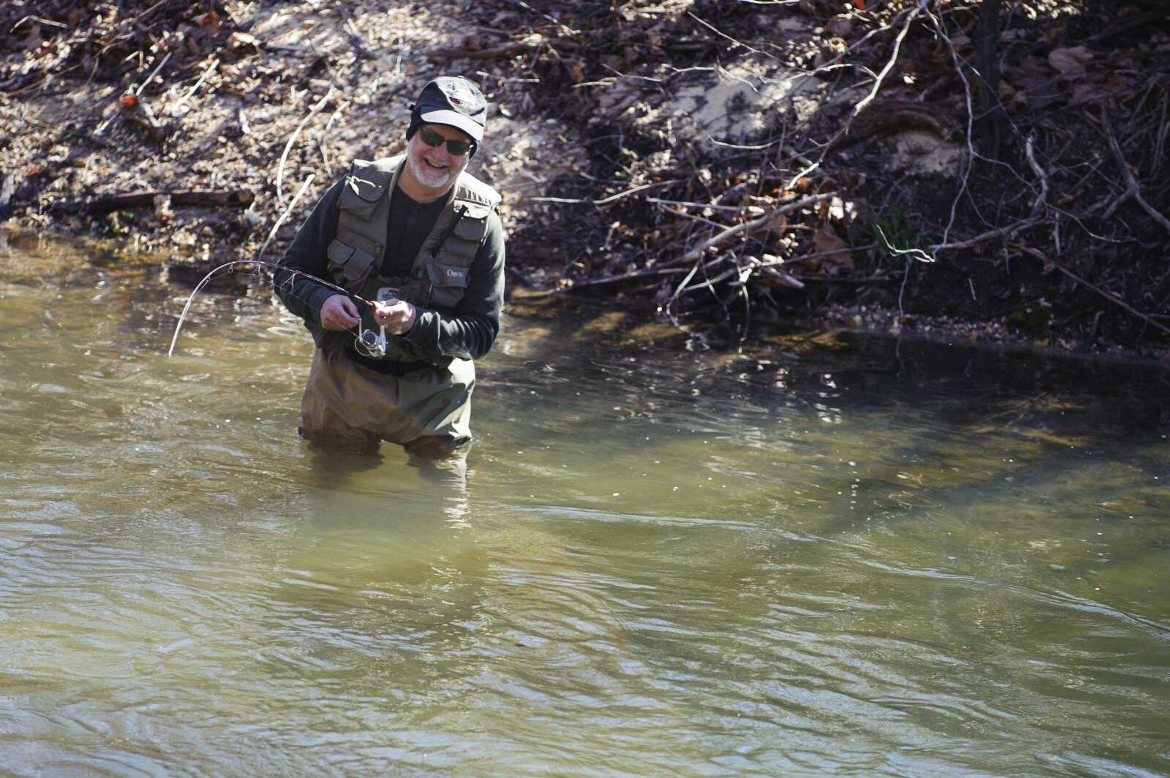 Bob Belyew of St. Louis fishes in the Current River on March 20 in the Ozark National Scenic Riverways. After last year&#8217;s government shutdown and a proposed new management plan for the park, some are calling for the federal government to turn it over to the state. (Ryan Henriksen ~ The Columbia Daily Tribune)