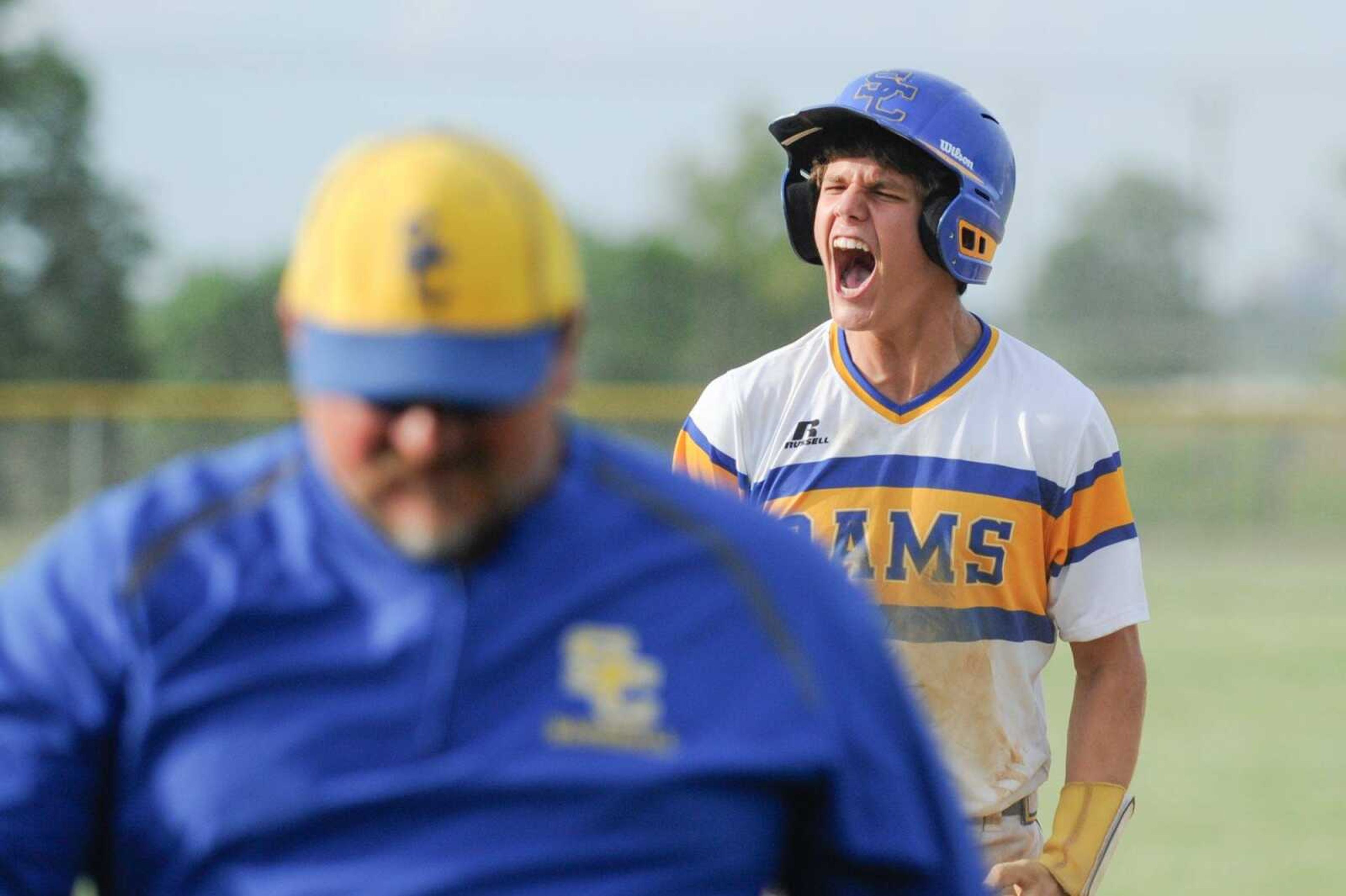 Scott City's Jordan Kluesner celebrates on third base after hitting a triple in the seventh inning against West County during a Class 3 quarterfinal Wednesday in Scott City, Missouri. The Rams won 7-3. (Glenn Landberg)