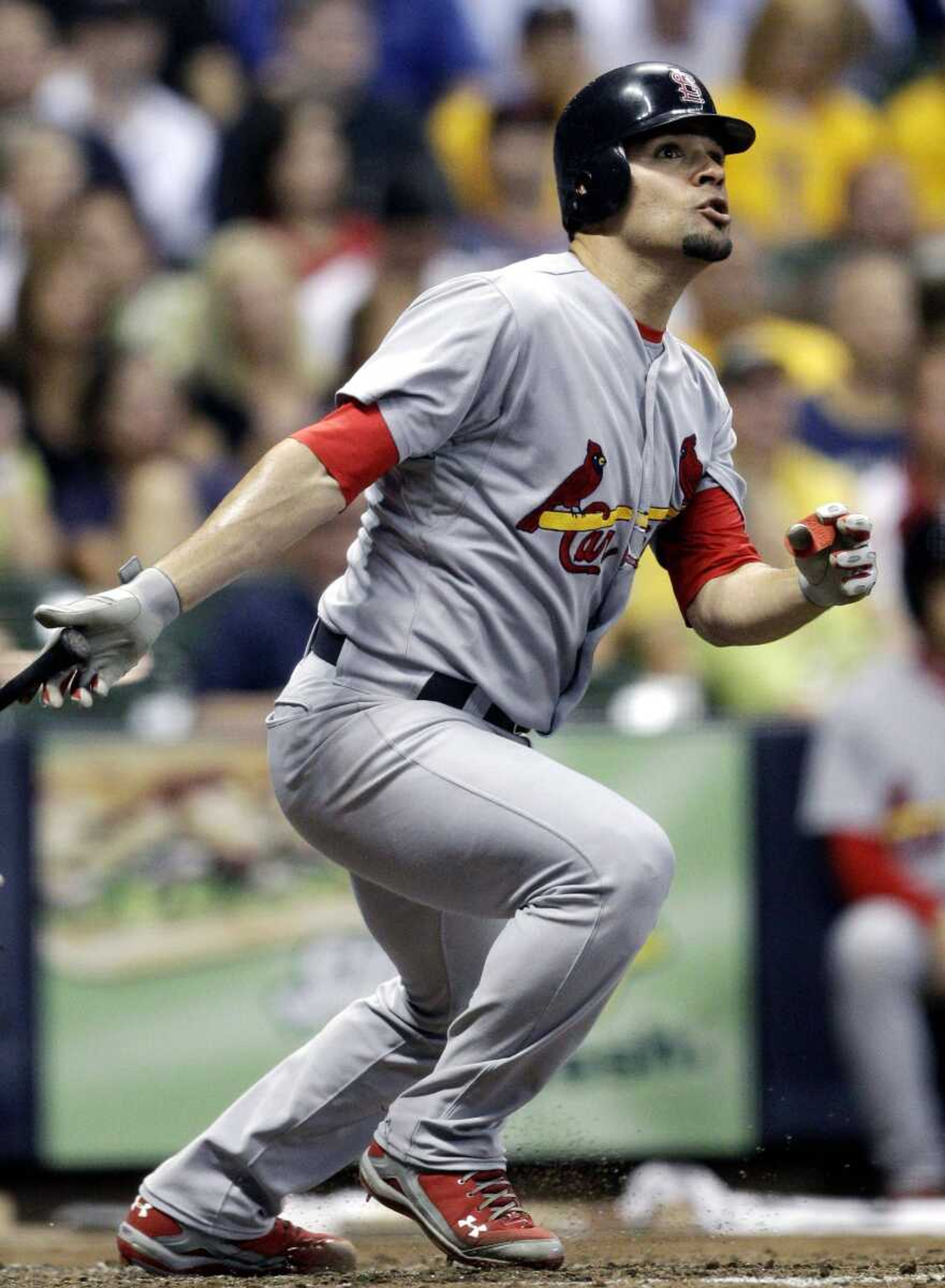 The Cardinals' Jaime Garcia follows through on a three-run home run against the Brewers during the fourth inning Tuesday in Milwaukee. (Morry Gash ~ Associated Press)