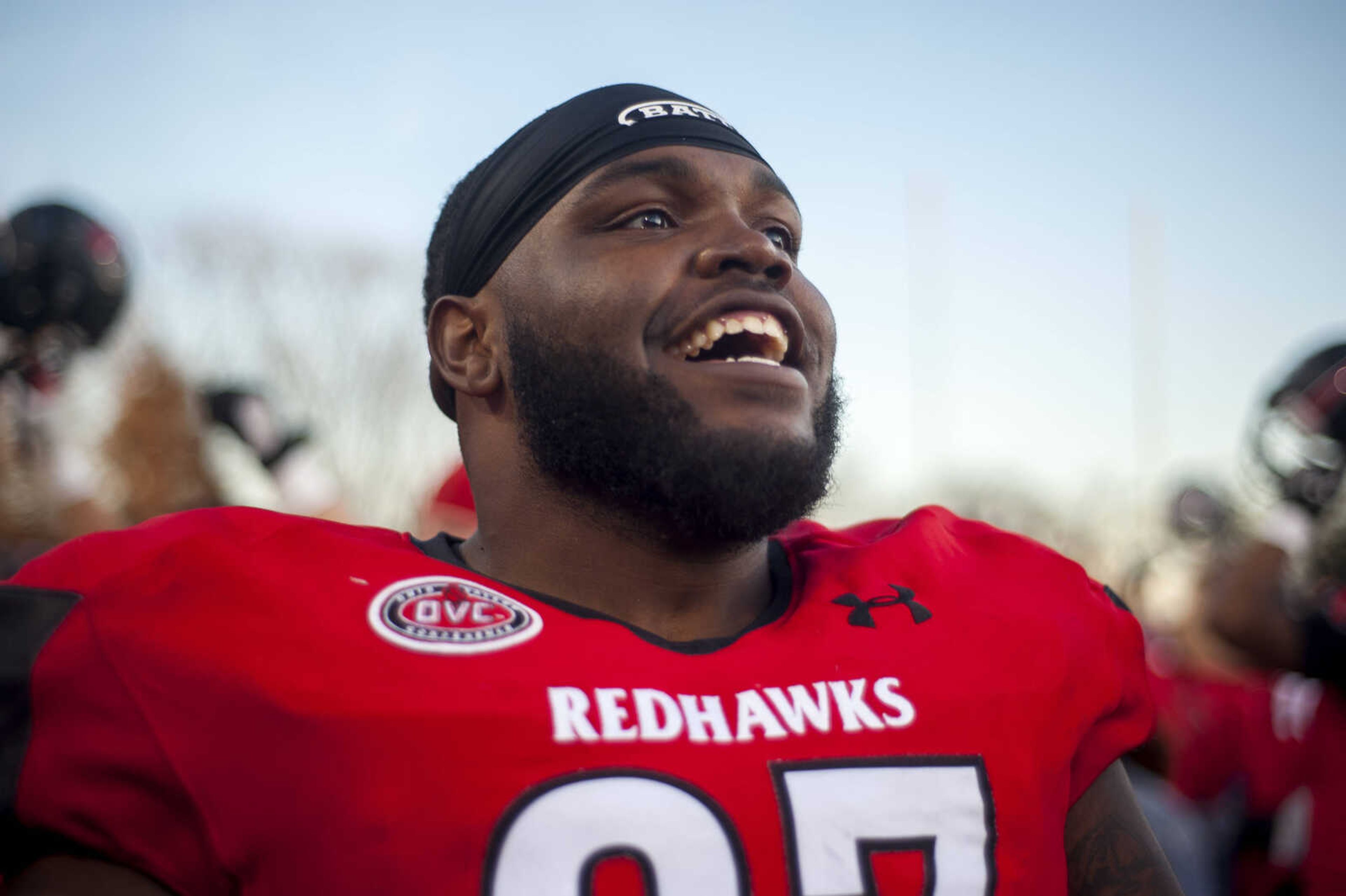 Southeast defensive lineman Cameron Meeks (97) smiles as the Redhawks band plays after the Redhawks' 28-14 win over Stony Brook at Houck Stadium Saturday.