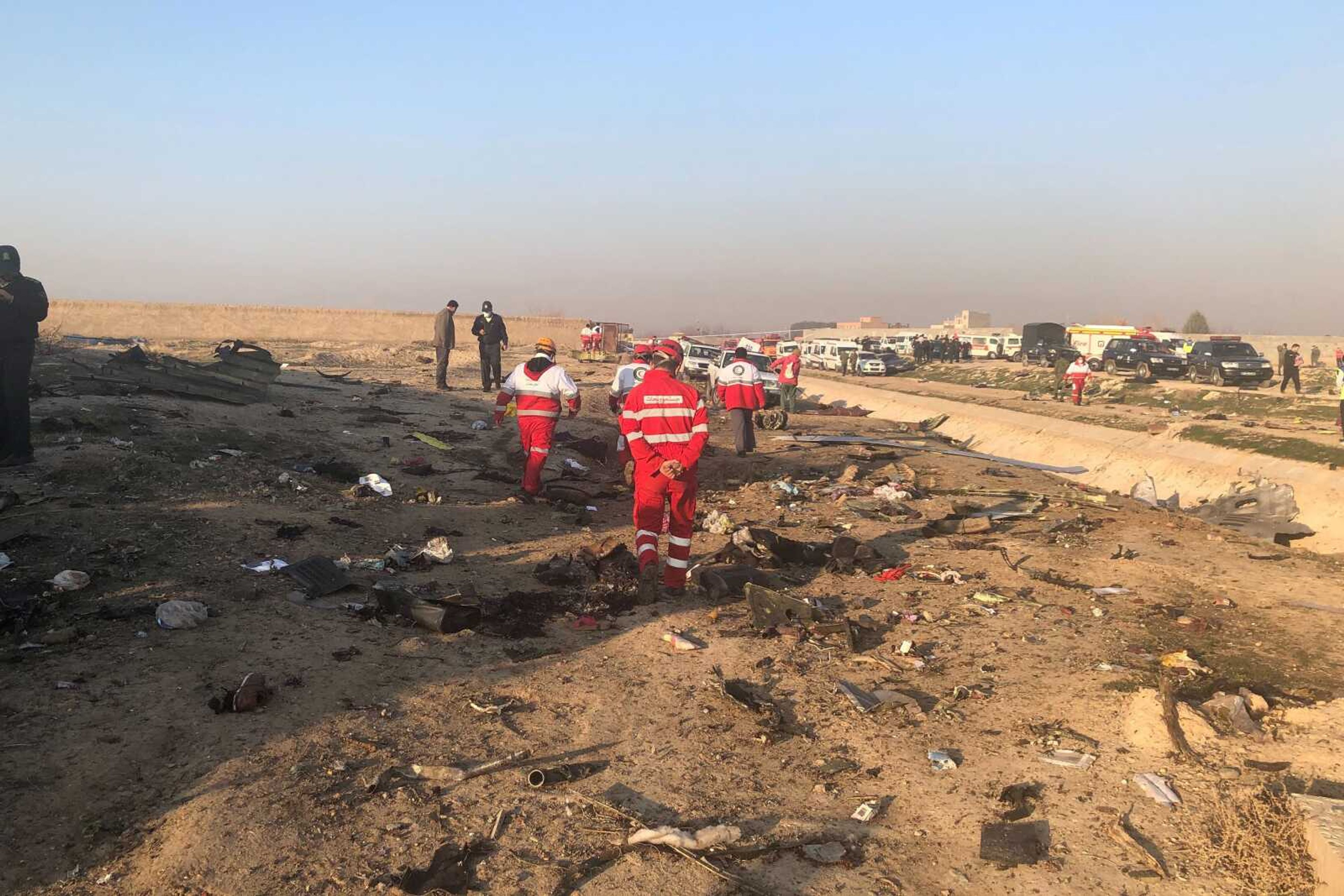 Debris is seen Wednesday from a plane crash on the outskirts of Tehran, Iran. A Ukrainian airplane carrying 176 people crashed shortly after takeoff from Tehran's main airport, killing all onboard.