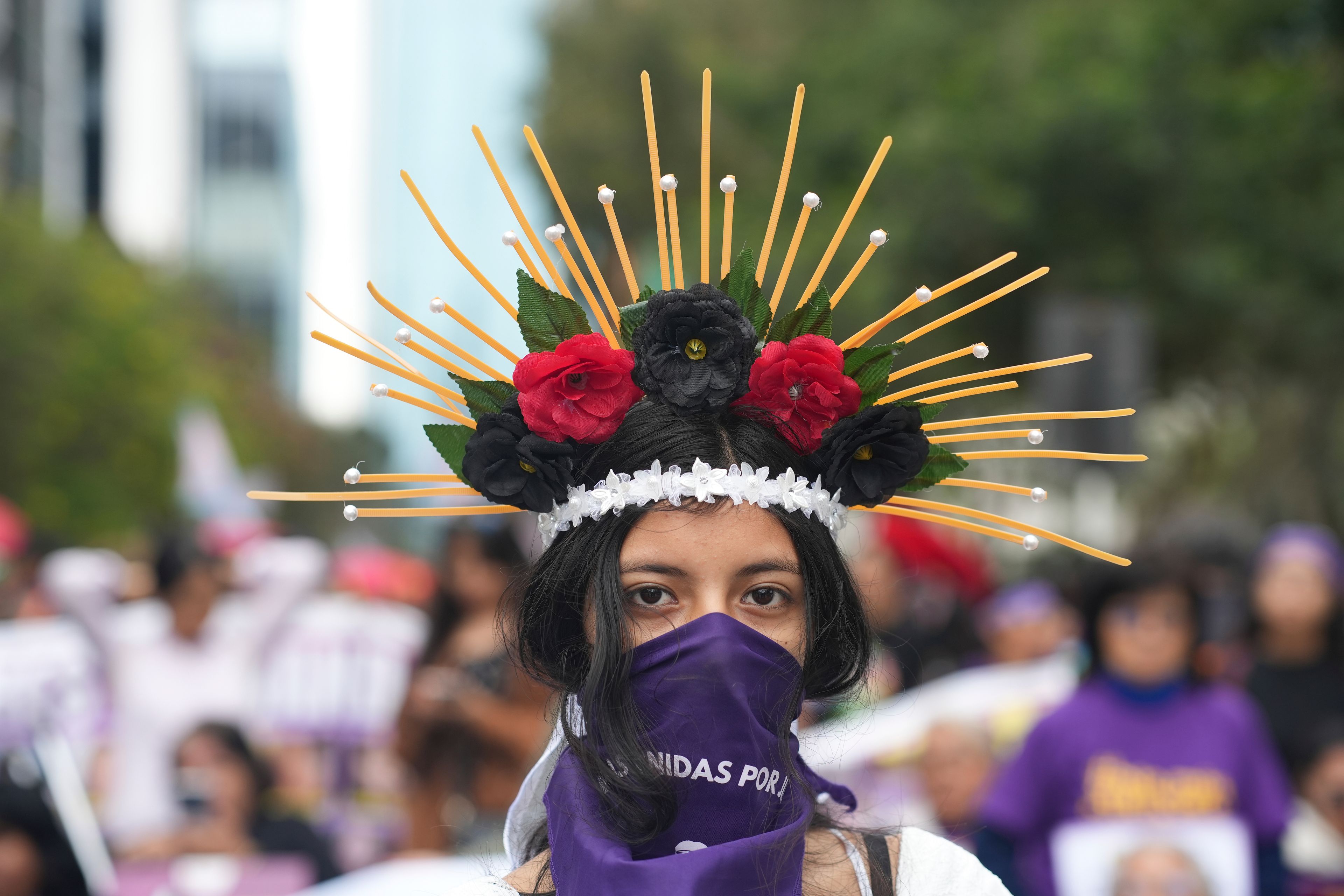 Marieta Correa takes part in a march marking the upcoming International Day for the Elimination of Violence Against Women, in Lima, Peru, Saturday, Nov. 23, 2024. (AP Photo/Guadalupe Pardo)