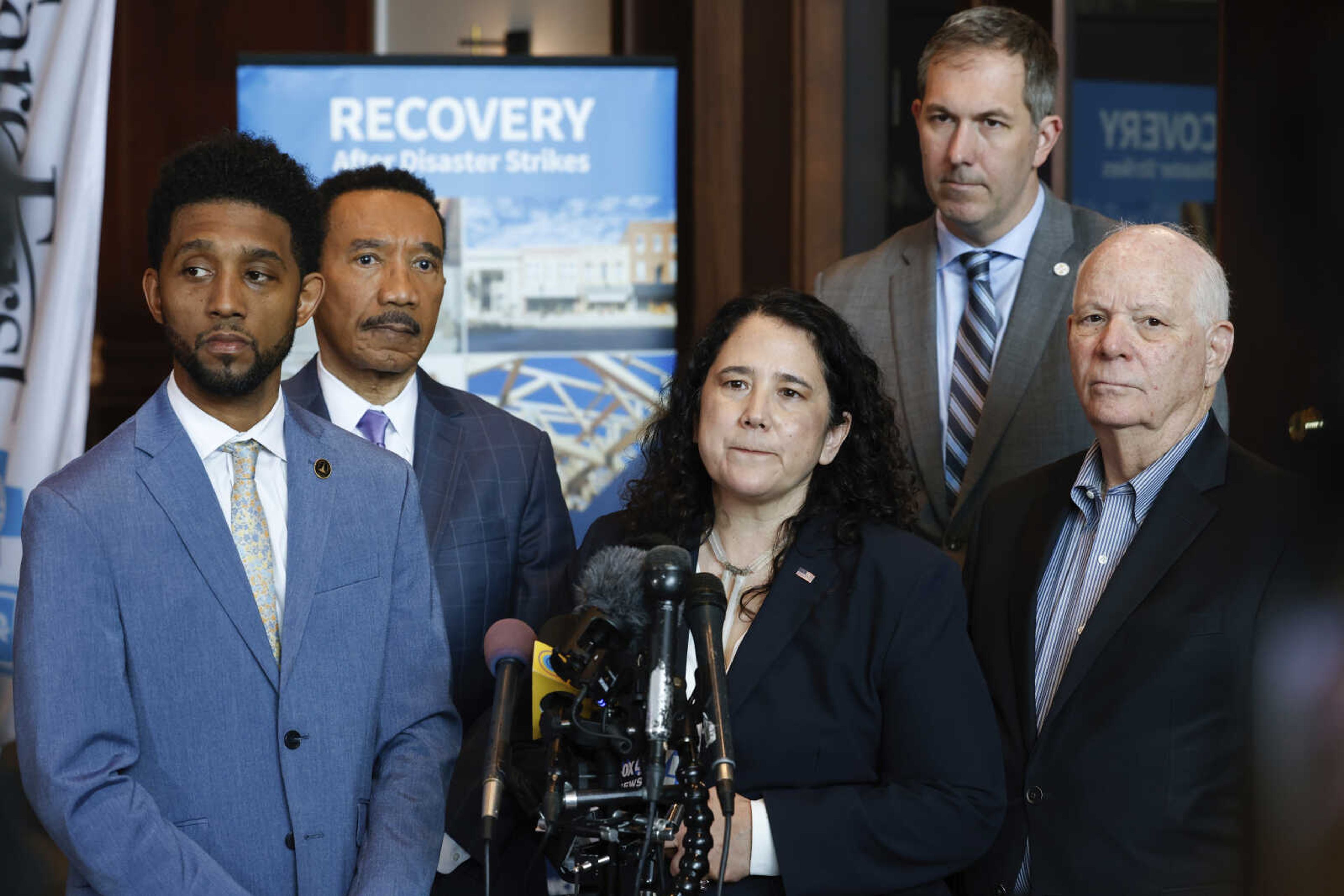 Small Business Administration administrator Isabel Guzman, surrounded by Baltimore Mayor Brandon Scott, from left, Rep. Kweisi Mfume, D-Md., Baltimore County Executive Johnny Olszewski and Sen. Ben Cardin, D-Md., speaks during a press conference at the SBA business recovery center, Thursday, April 4, 2024, in Baltimore. (AP Photo/Julia Nikhinson)