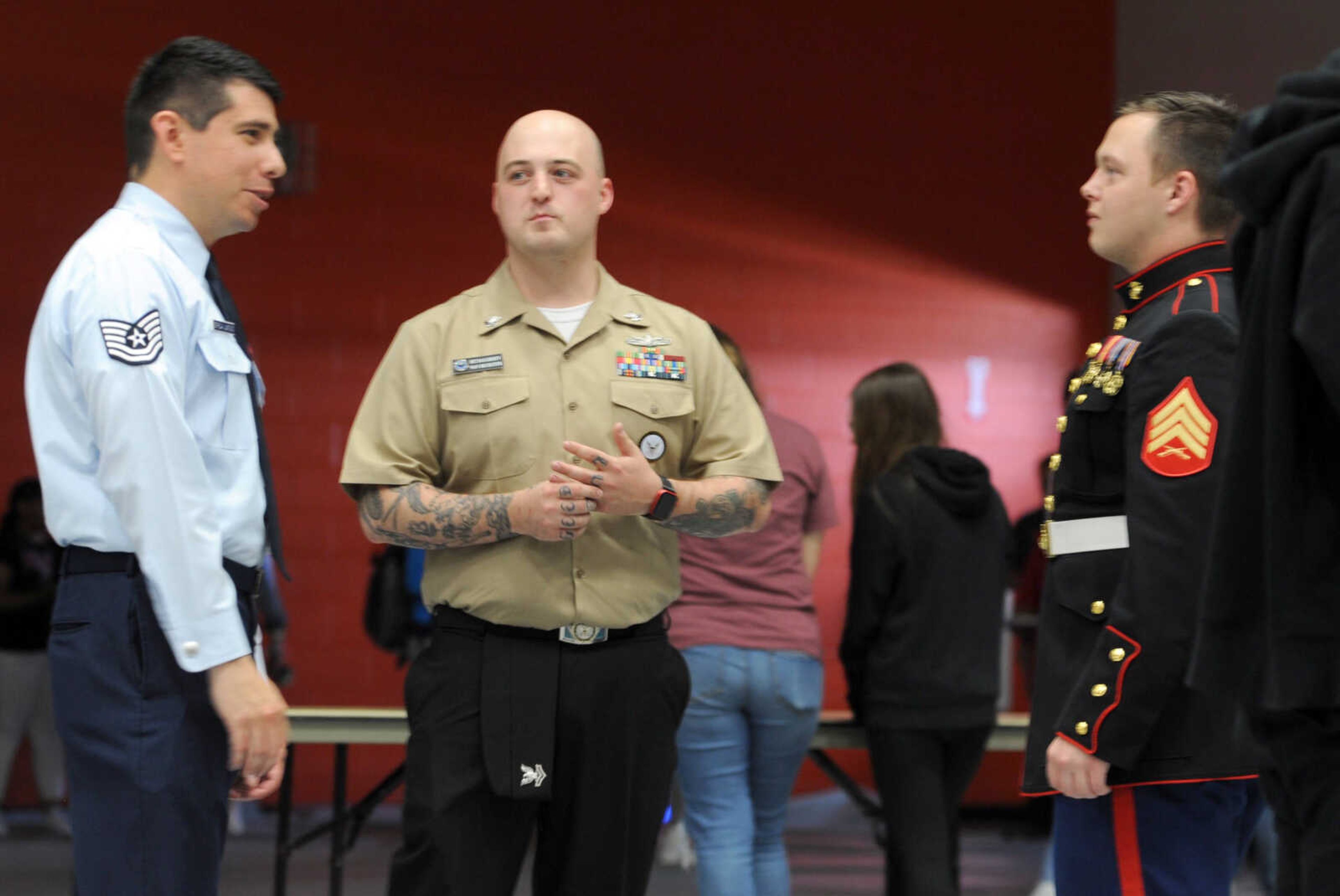 Recruiters for, from left, the Air Force, Navy and Marines, represented the U.S. military during Friday’s Cape Girardeau Central High School’s Senior Decision Day.