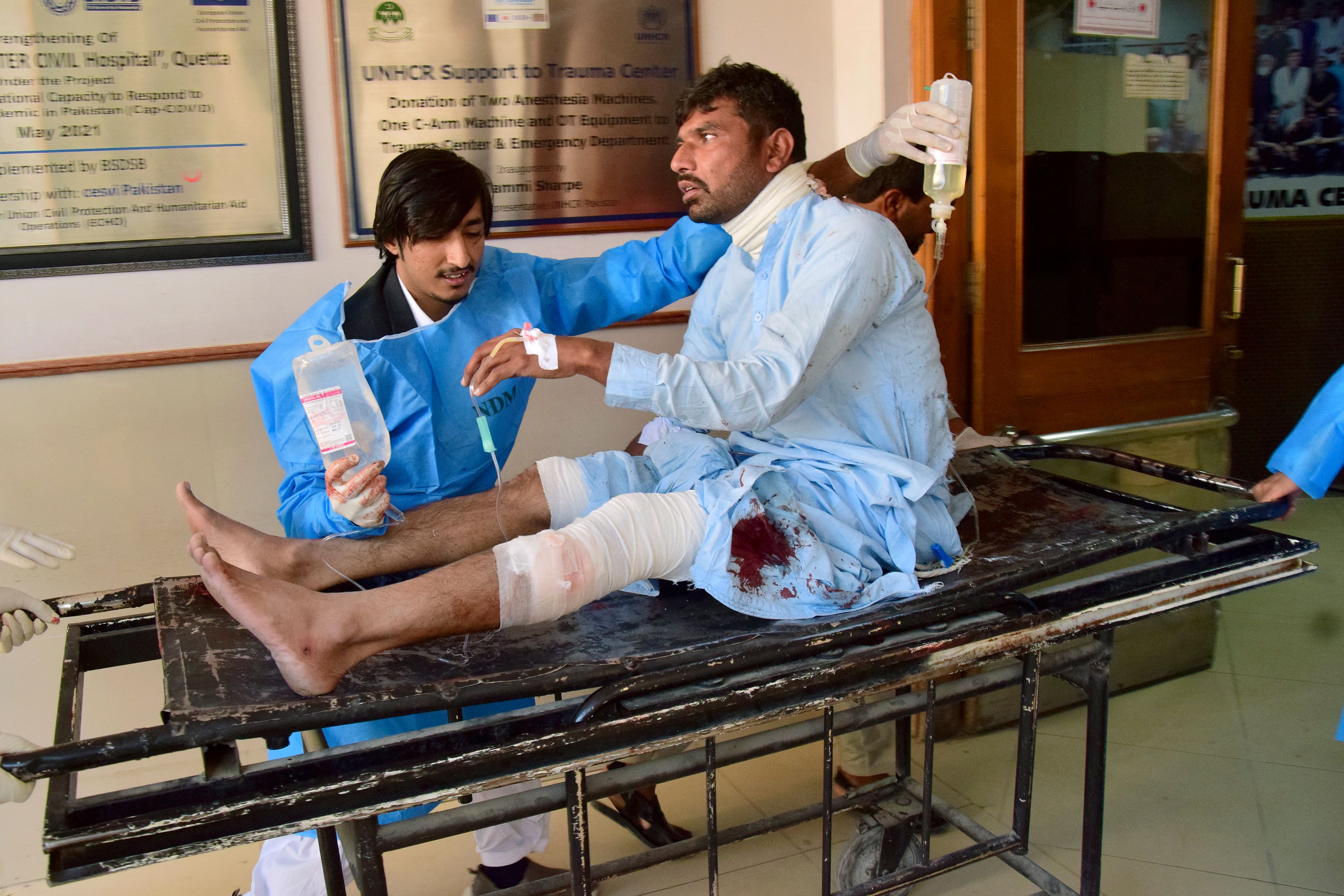 An injured victim of bomb explosion at railway station, is treated at a hospital in Quetta, southwestern Pakistan, Saturday, Nov. 9, 2024. (AP Photo/Arshad Butt)