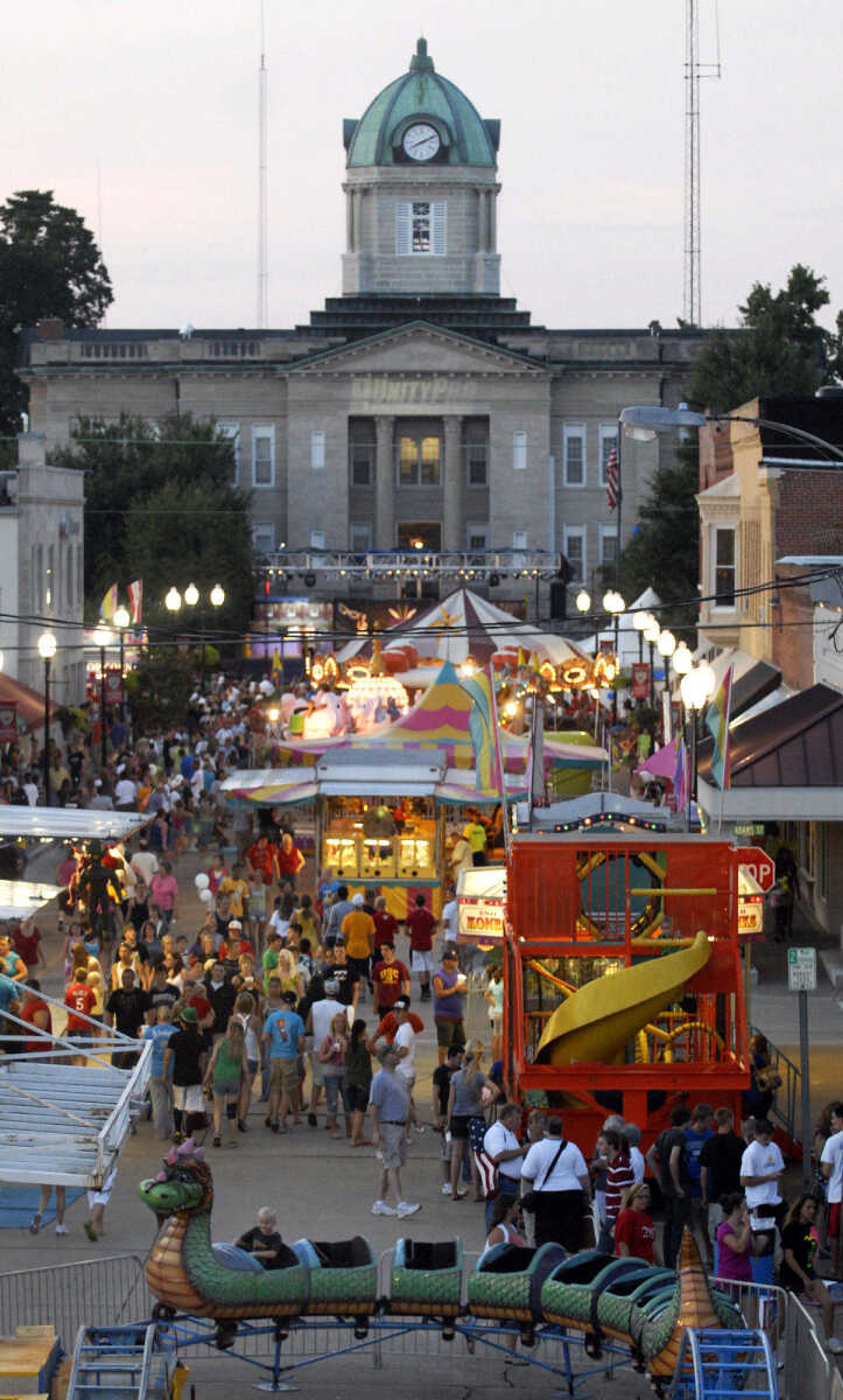 KRISTIN EBERTS ~ keberts@semissourian.com

Crowds fill the streets at the 102nd Annual Homecomers Celebration in downtown Jackson on Tuesday, July 27, 2010. Tuesday marked the opening day of the celebration, which lasts through Saturday.