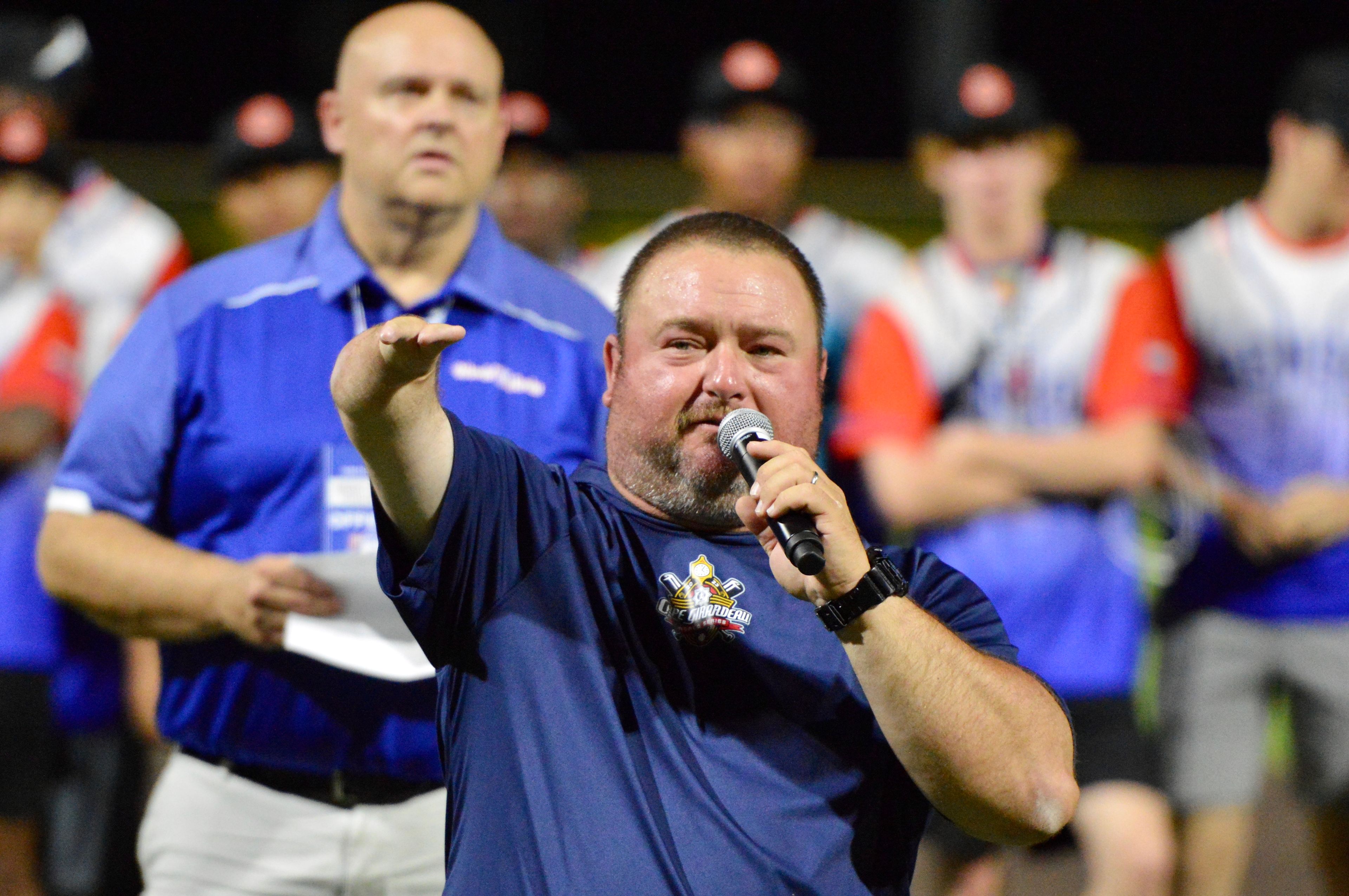 Charleston Fighting Squirrels head coach and Babe Ruth World Series tournament director Michael Minner addresses the crowd on Thursday, Aug. 15, at Capaha Field in Cape Girardeau, Mo. 