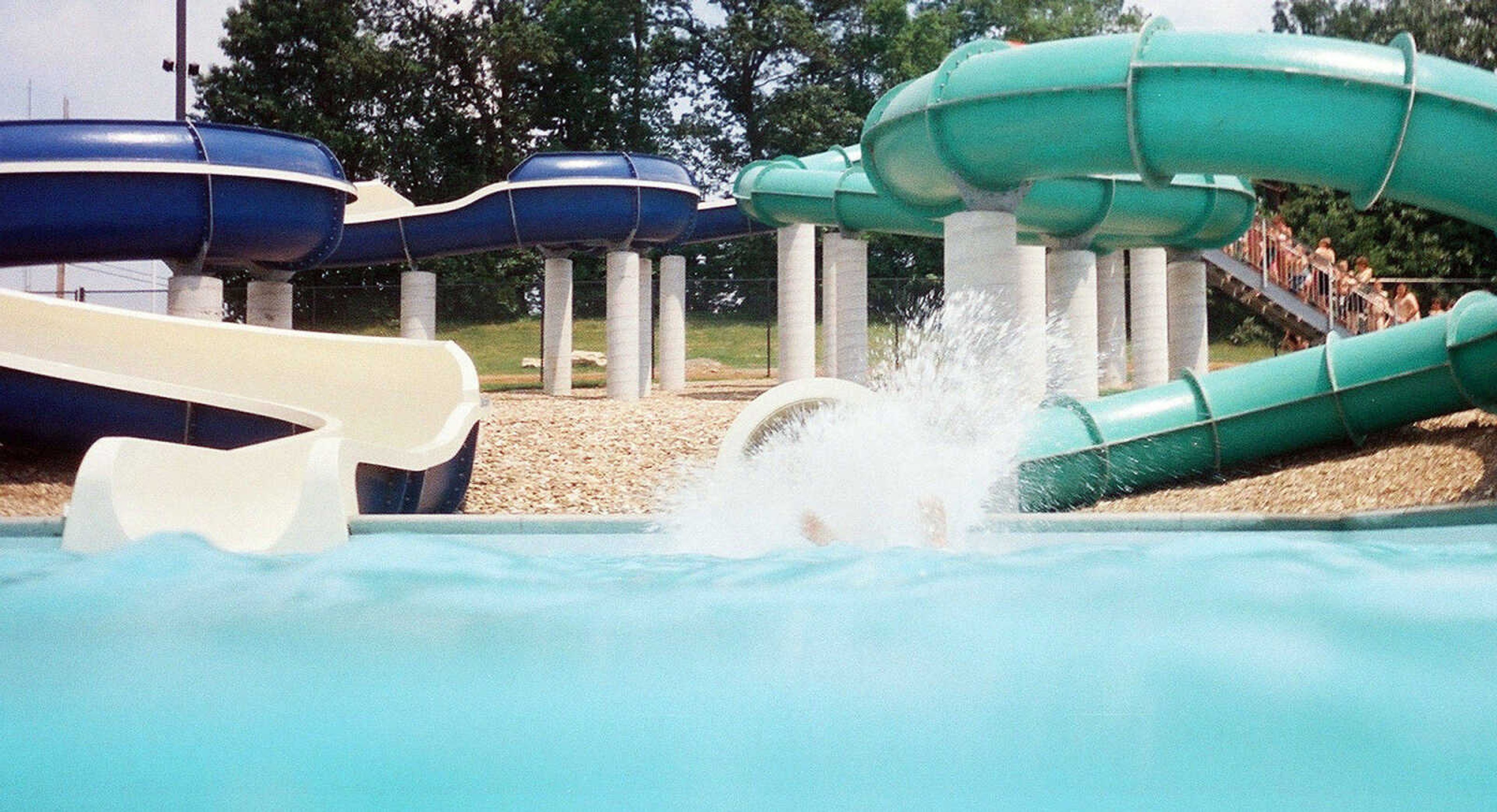 LAURA SIMON~lsimon@semissourian.com
A visitor to Cape Splash Family Auquatic Center makes a splash after sliding out of the 140 foot enclosed flume Saturday, May 29, 2010.