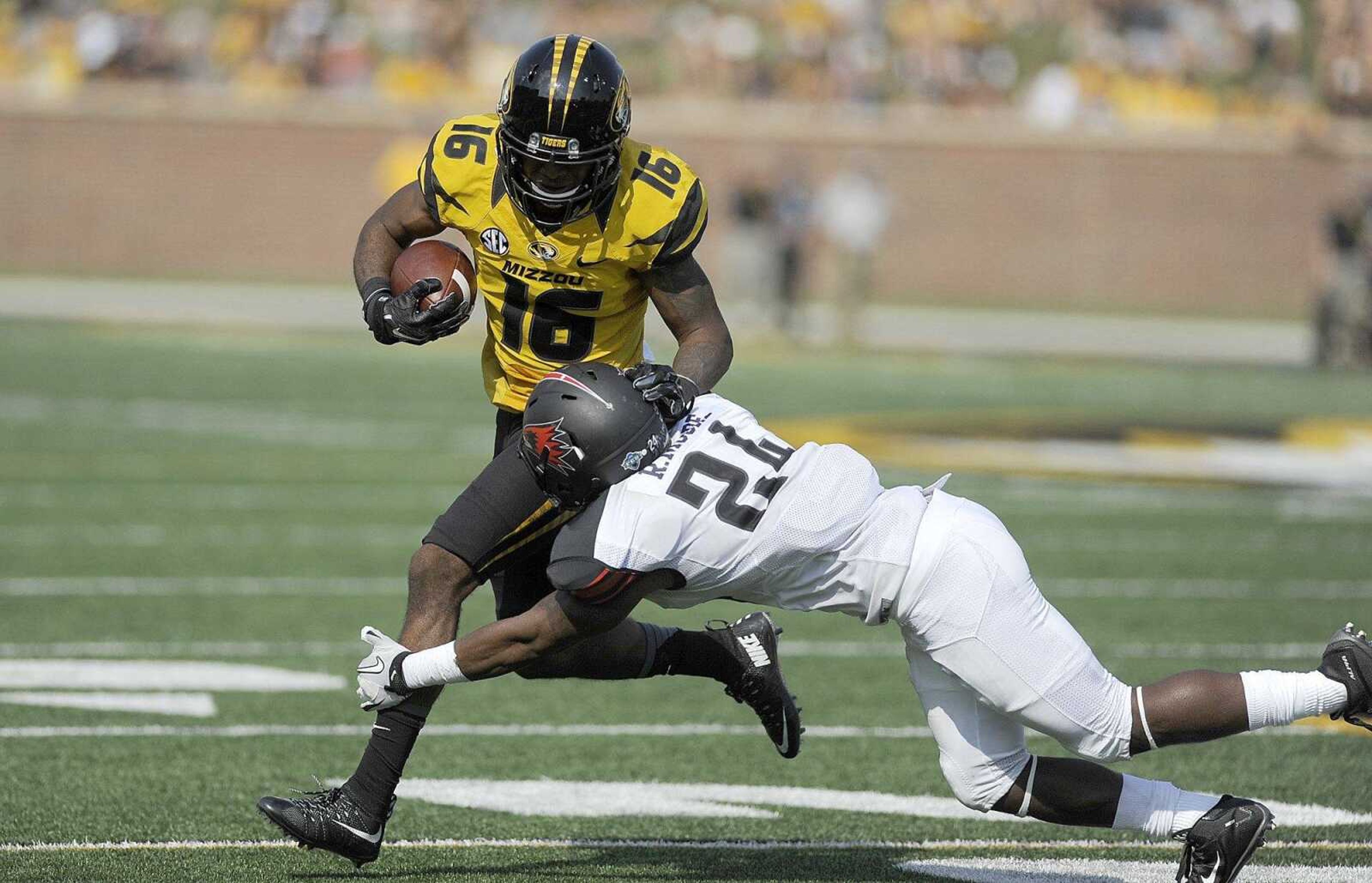 Southeast Missouri State's Ryan Moore tackles Mizzou's Thomas Richard in the second quarter, Saturday, Sept. 5, 2015, at Faurot Field in Columbia, Missouri. Mizzou defeated Southeast 34-3. (Laura Simon)