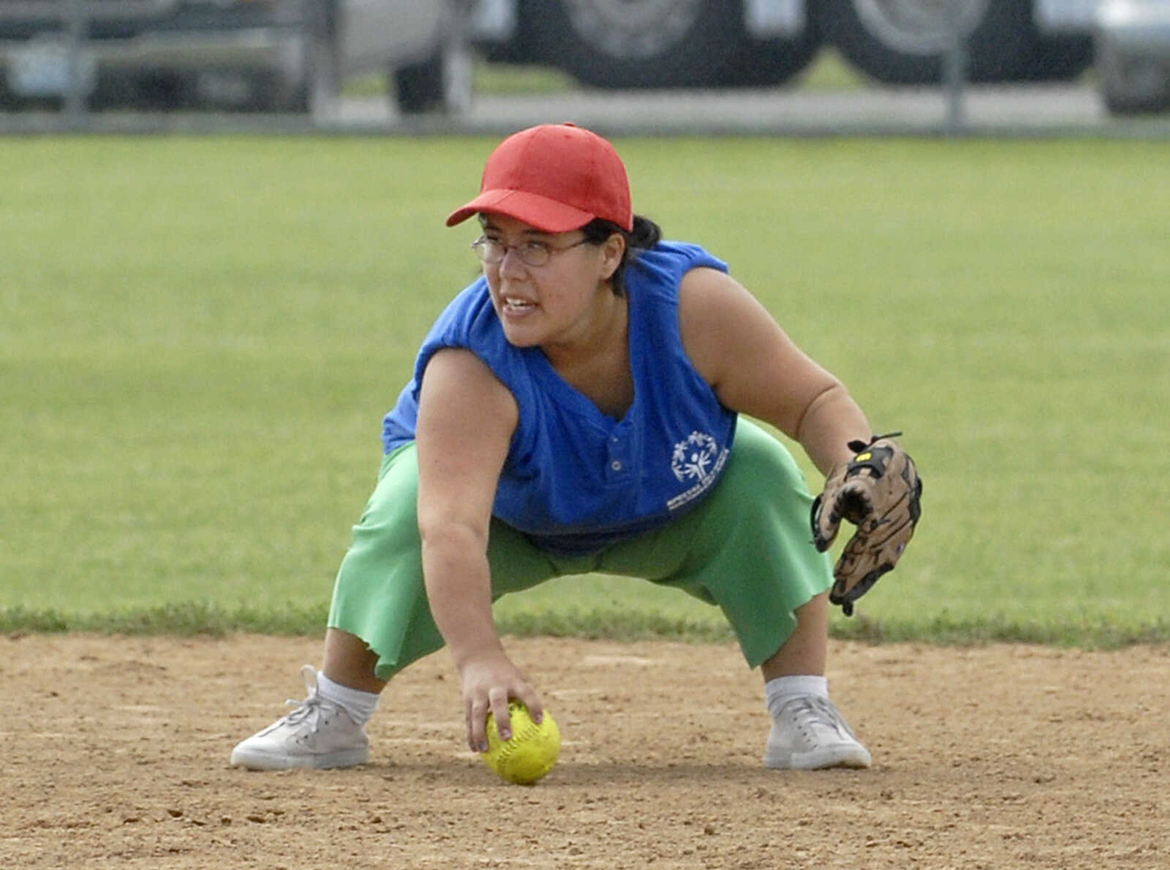 LAURA SIMON ~ lsimon@semissourian.com
The SW Sharks short stop Jessica Shand fields a grounder Saturday, August 13, 2011 during the Special Olympics State Outdoor Championship at Shawnee Sports Complex in Cape Girardeau.