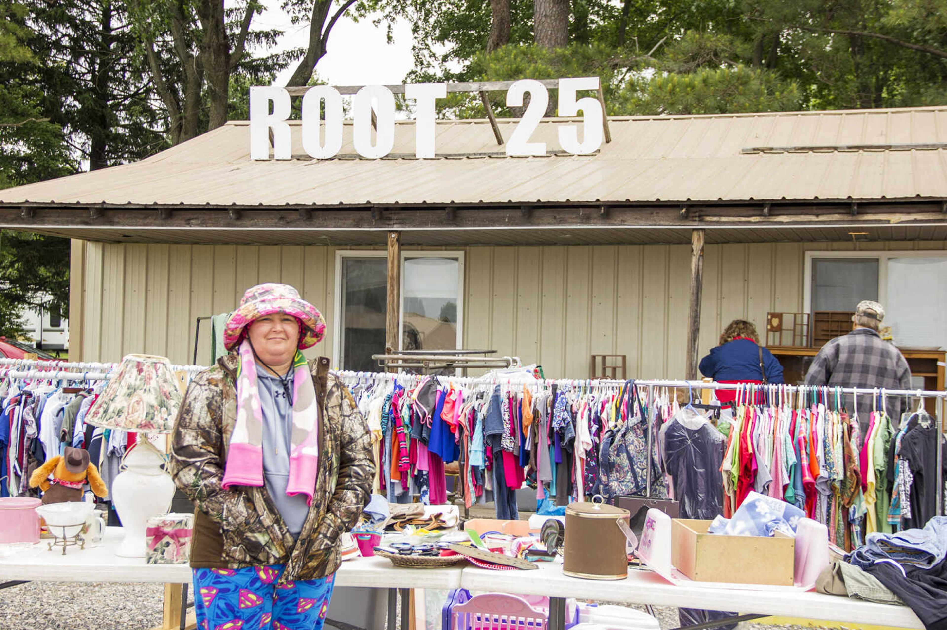 CAROL KELLISON ~ photo@semissourian.com

Driea Rodgers poses outside of her building during the 100-mile yard sale on Thursday May 22, 2015 in Advance, Missouri.