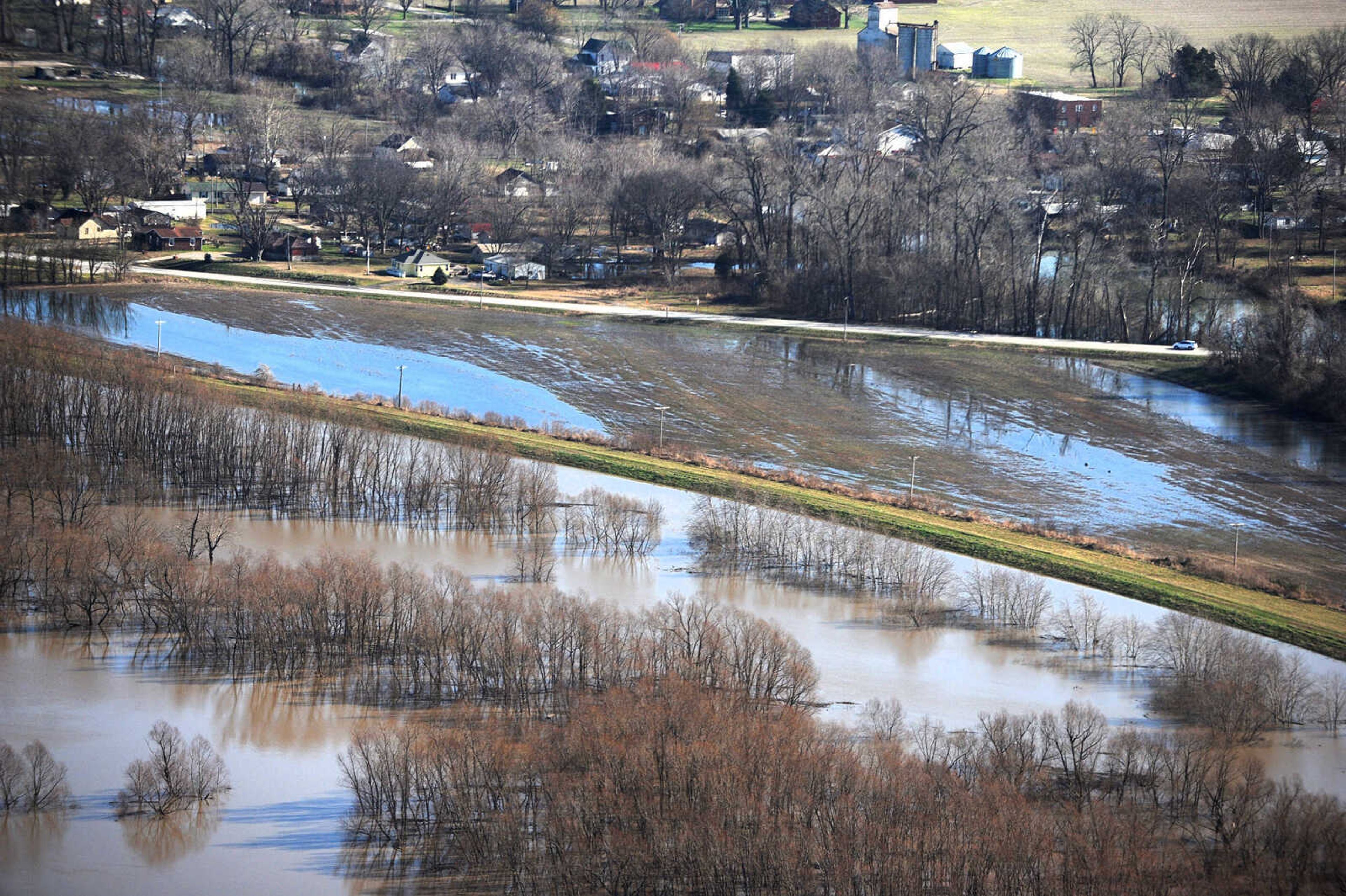 LAURA SIMON ~ lsimon@semissourian.com

Water seeps into portions of McClure, Illinois as the swollen Mississippi River pushes against the levee protecting the Southern Illinois town, Saturday, Jan. 2, 2016.