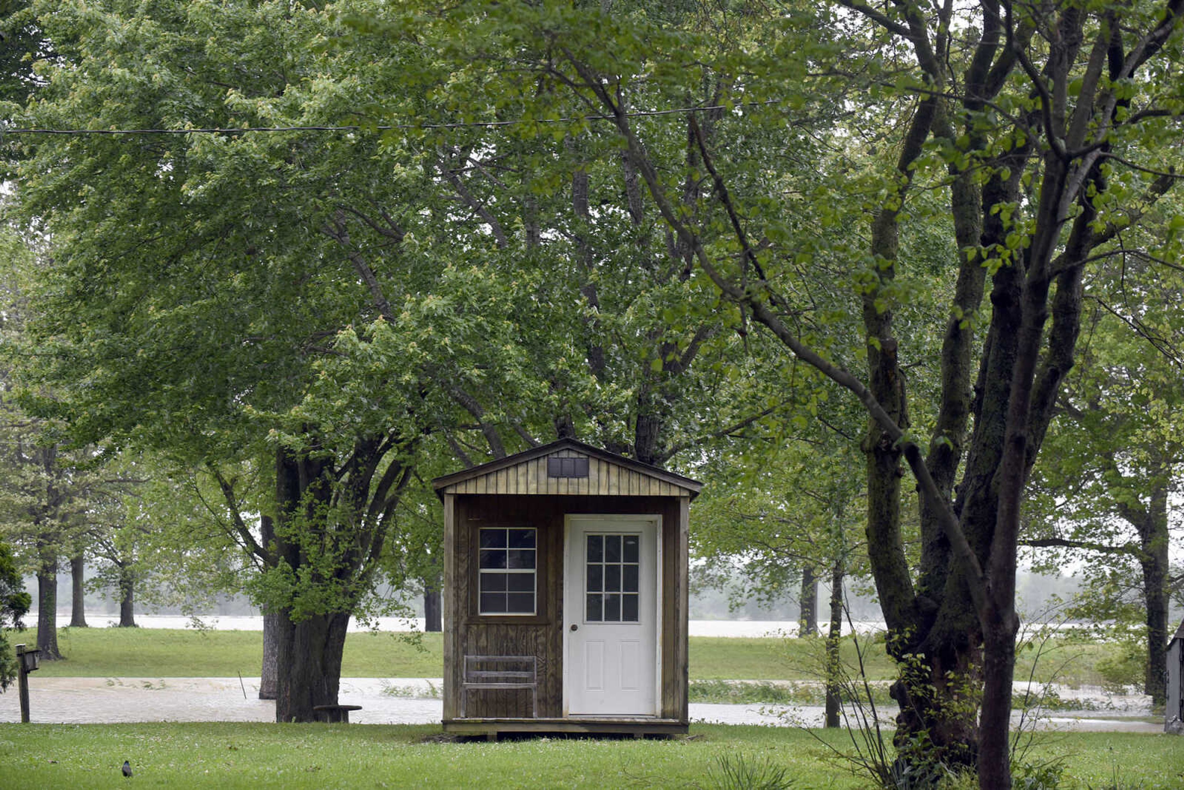 Floodwater creeps closer to homes along Cape Girardeau County Road 238 on Thursday, May 4, 2017, in Allenville, Missouri.