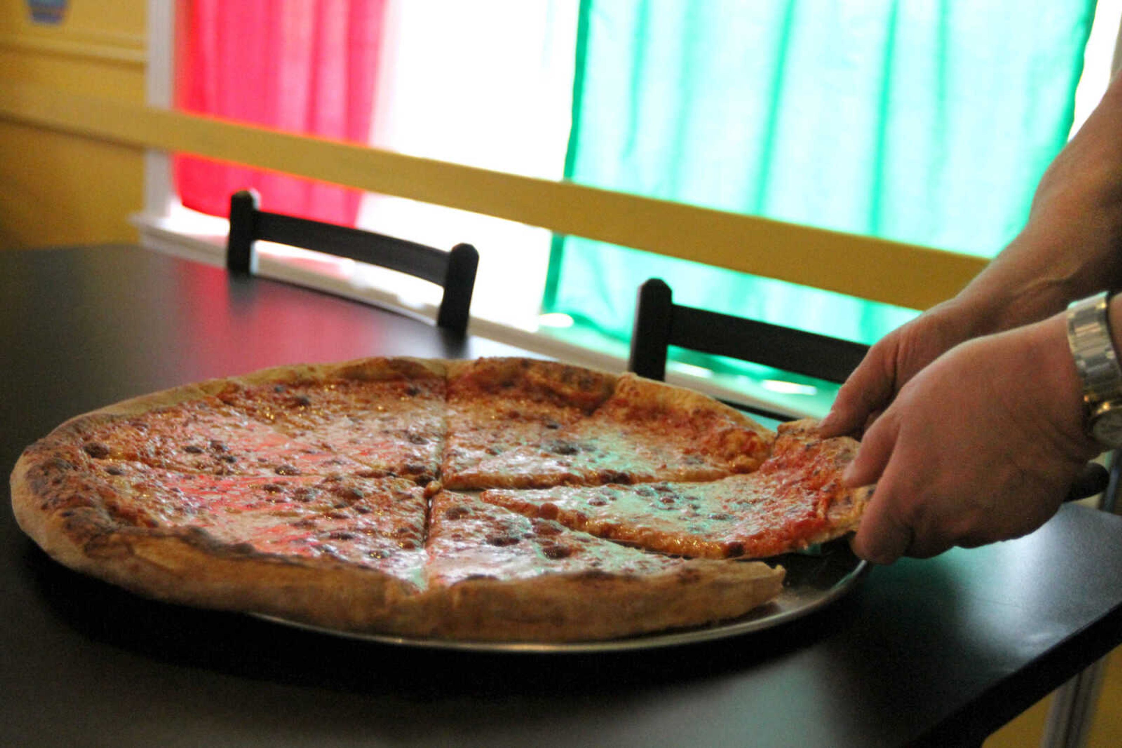 GLENN LANDBERG ~ glandberg@semissourian.com

Cheese pizza at Mario and Angela's Italian Cucina Wednesday, March 18, 2015.