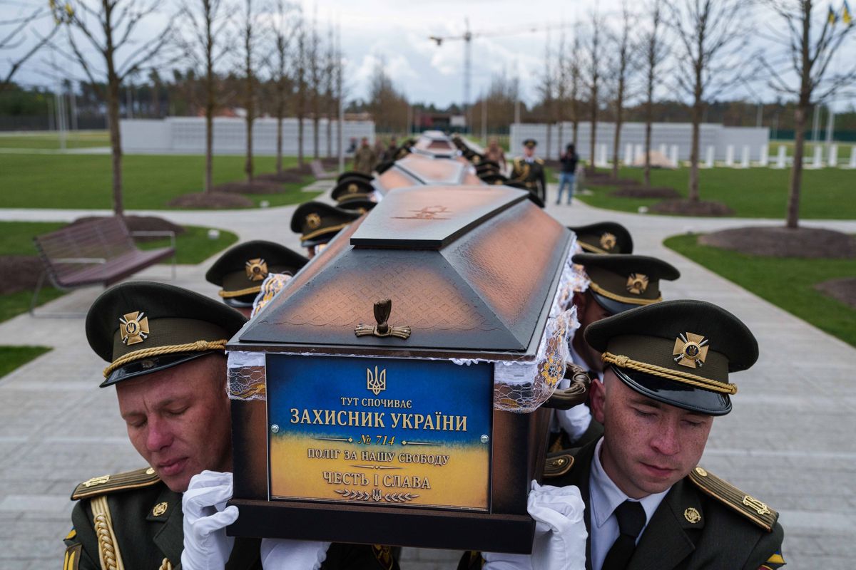 Ukraine buries its unknown soldiers as families wait for ide...