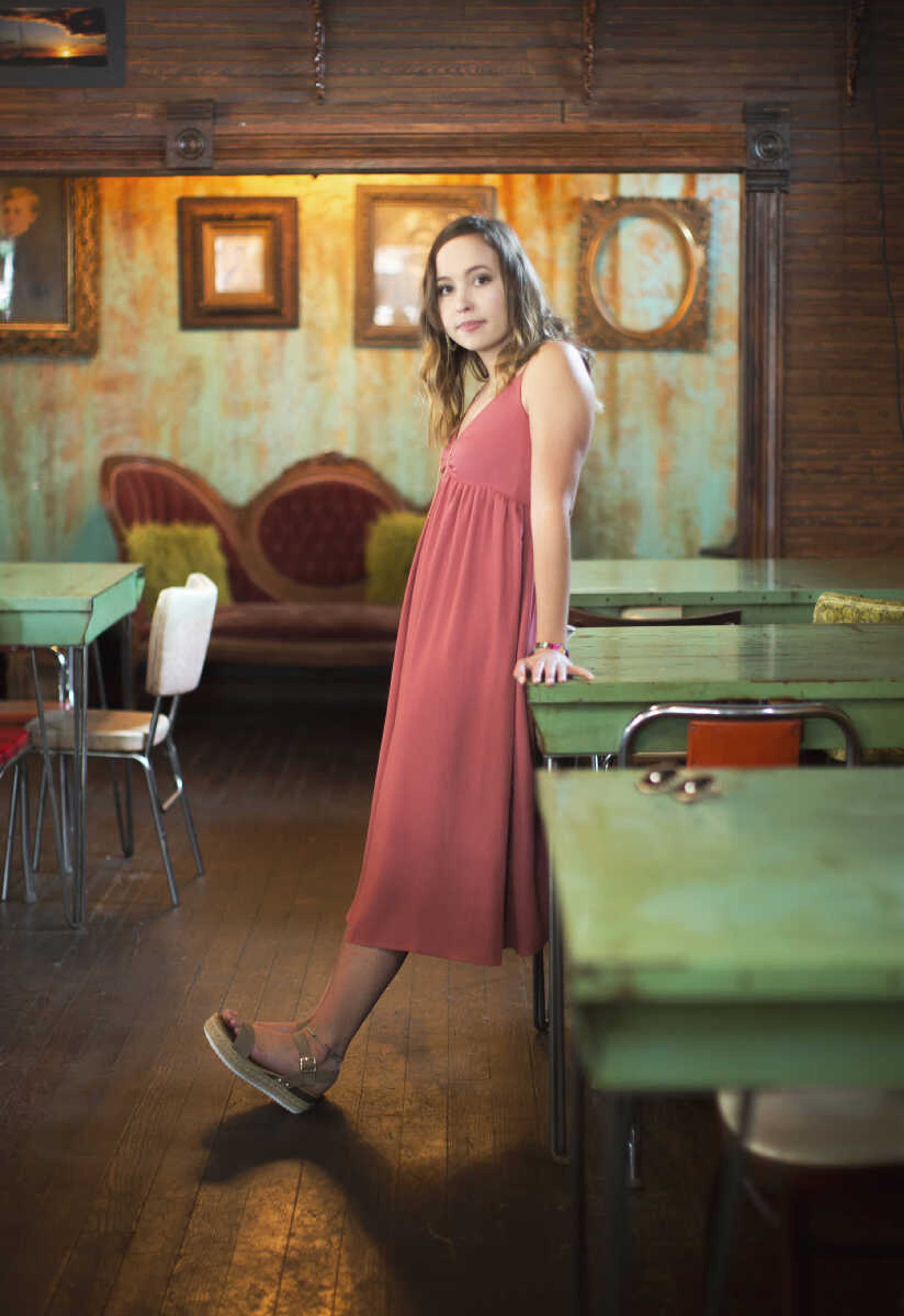 Emily Sachs models clothes, shoes and jewelry from Jenny May Boutique in Cape Girardeau.