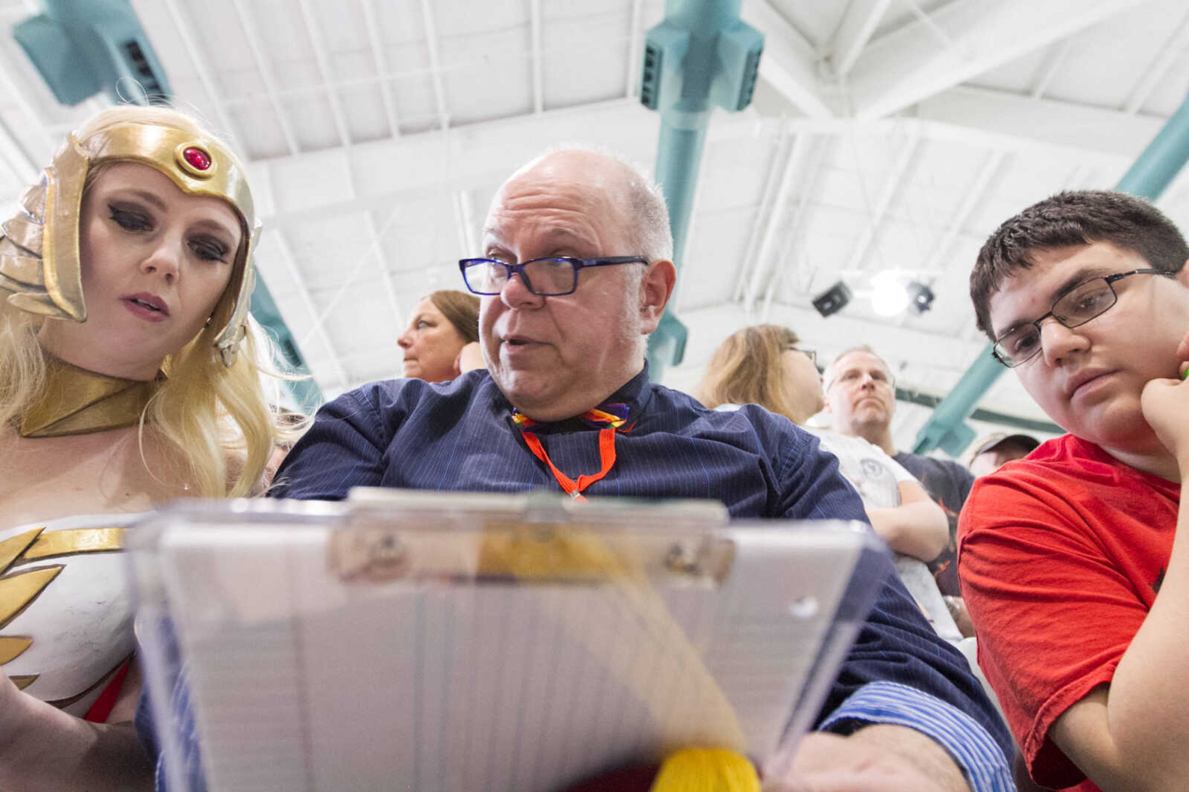 GLENN LANDBERG ~ glandberg@semissourian.com


Desiree, who wished not to giver her last name, Brian Morris and Brady Murphy deliberate while judging the costume contest during the Cape Comic Con Saturday, April 18, 2015 at the Osage Centre.