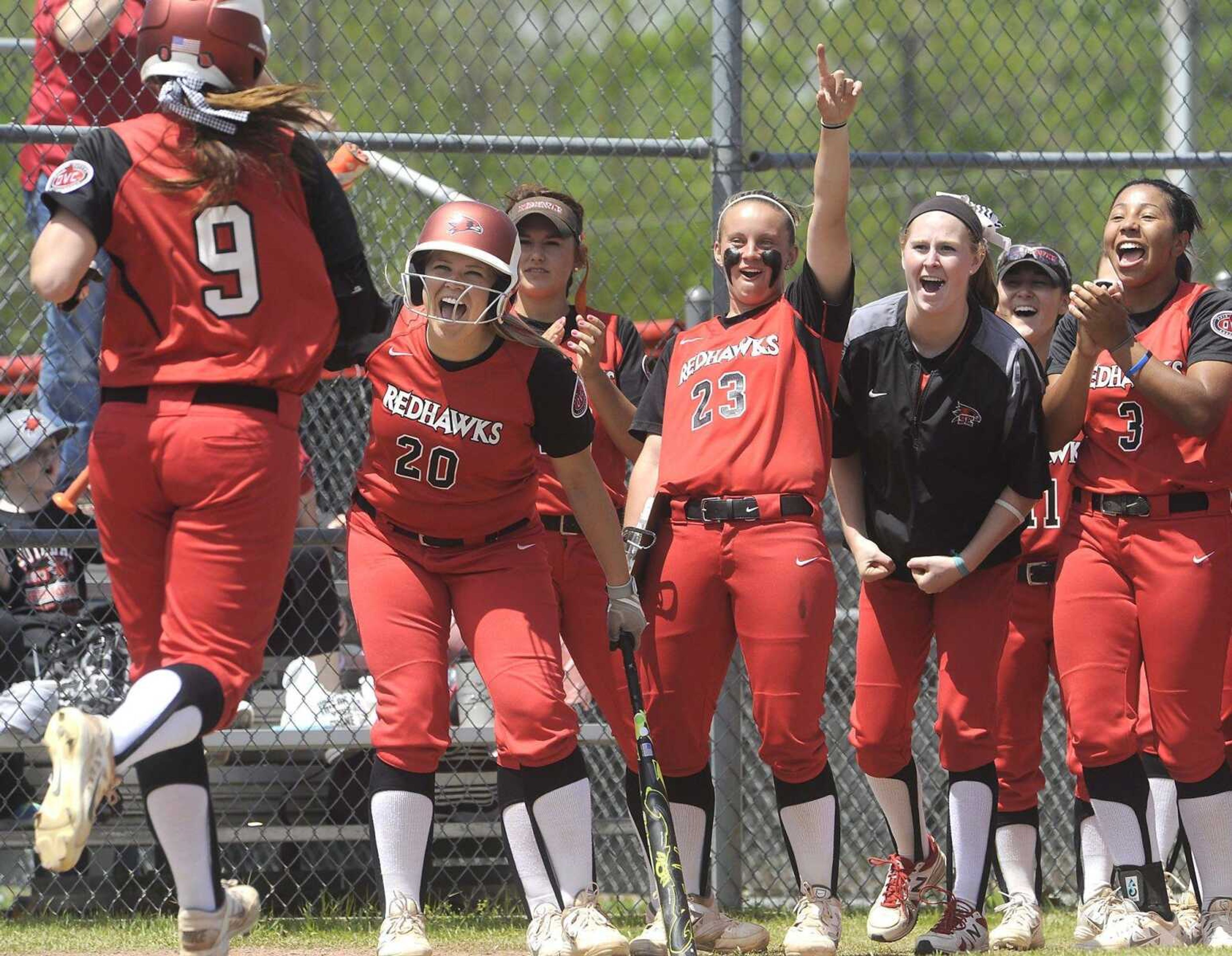 Southeast Missouri State's Kayla Fortner returns to her ecstatic teammates after  breaking the school's all-time single-season home run record with a shot to left field against Eastern Illinois during the first inning in the first game of a doubleheader Saturday at the Southeast Softball Complex. (Fred Lynch)