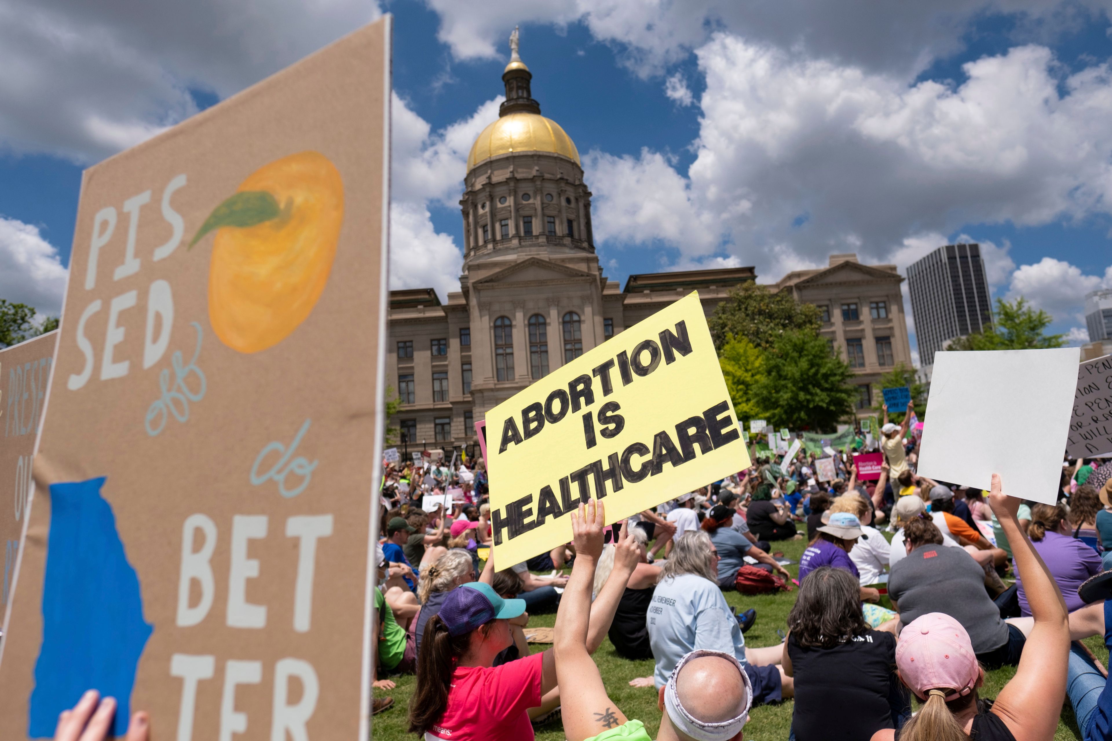 FILE - Abortion rights protesters rally near the Georgia state Capitol in Atlanta, on May 14, (Ben Gray/Atlanta Journal-Constitution via AP)