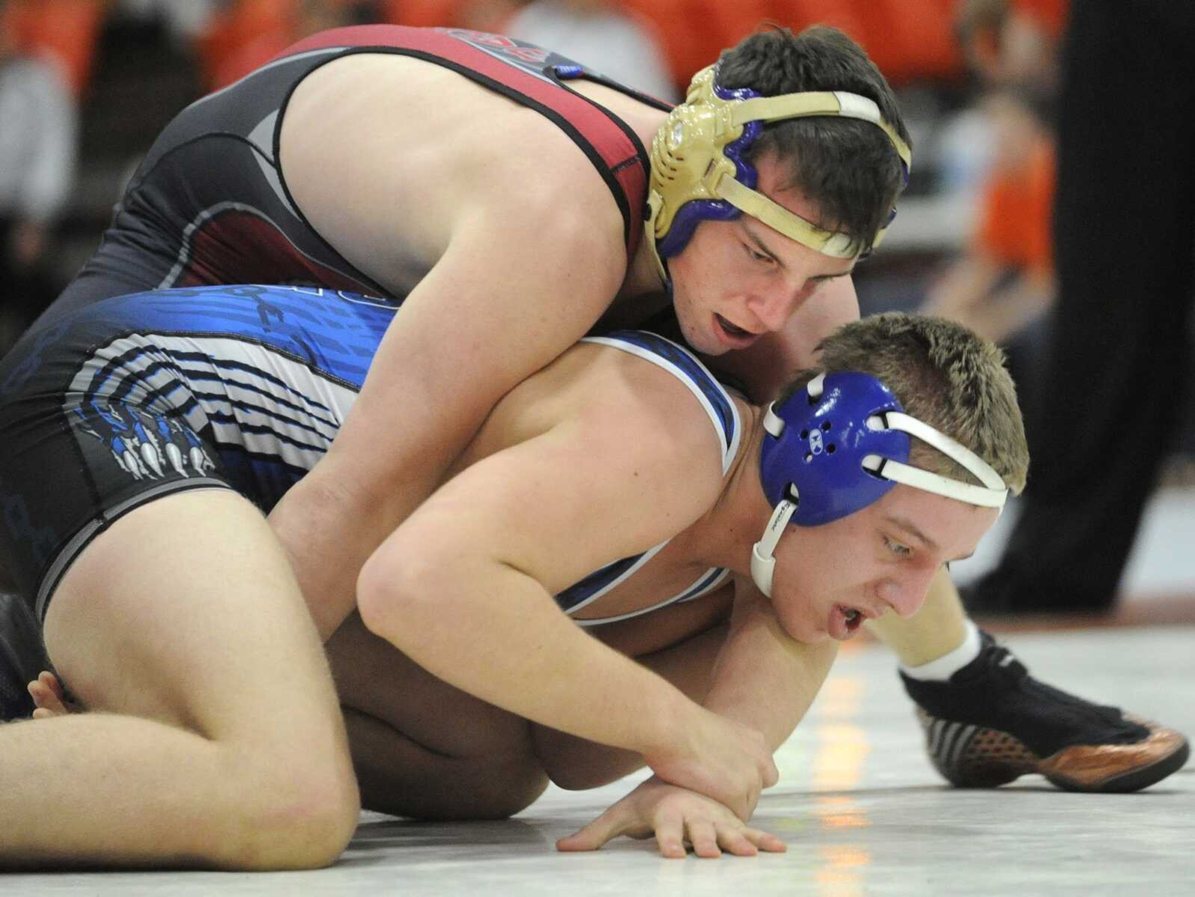 Jackson's Cody Morgan has the advantage over Northwest's Cameron Noland in their 170-pound championship match Saturday.