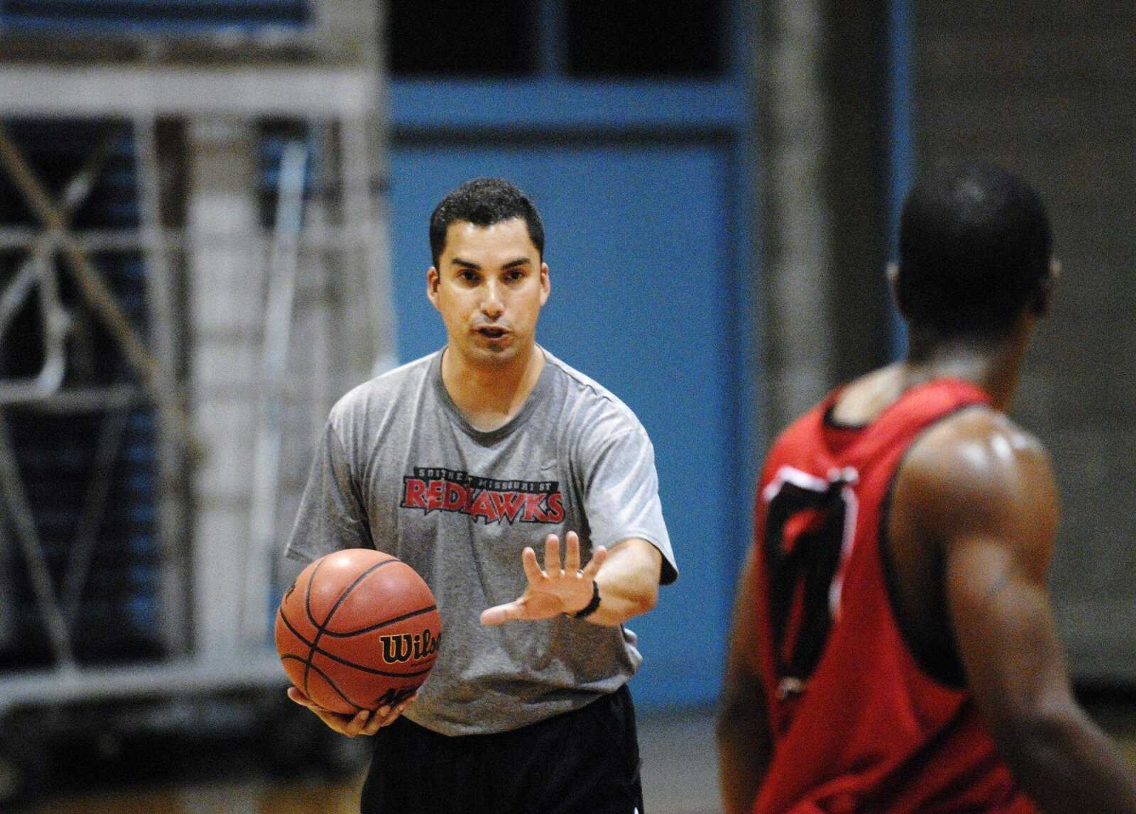 CHUCK WU ~ cwu@semissourian.com
Southeast acting men's basketball coach Zac Roman works with players during practice Friday at the Student Rec Center.