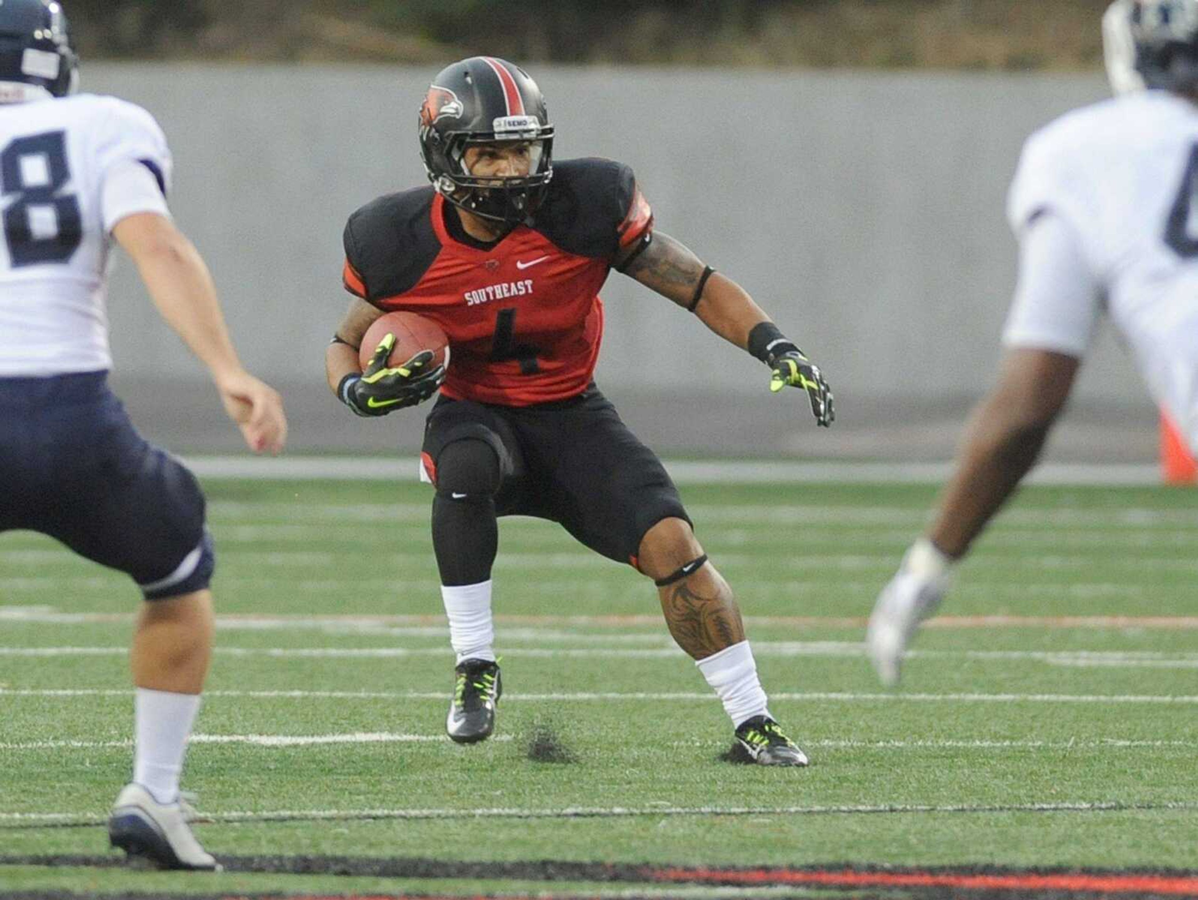 Southeast Missouri State&#8217;s Spencer Davis runs the ball during the season opener against Missouri Baptist on Thursday at Houck Stadium. (GLENN LANDBERG)