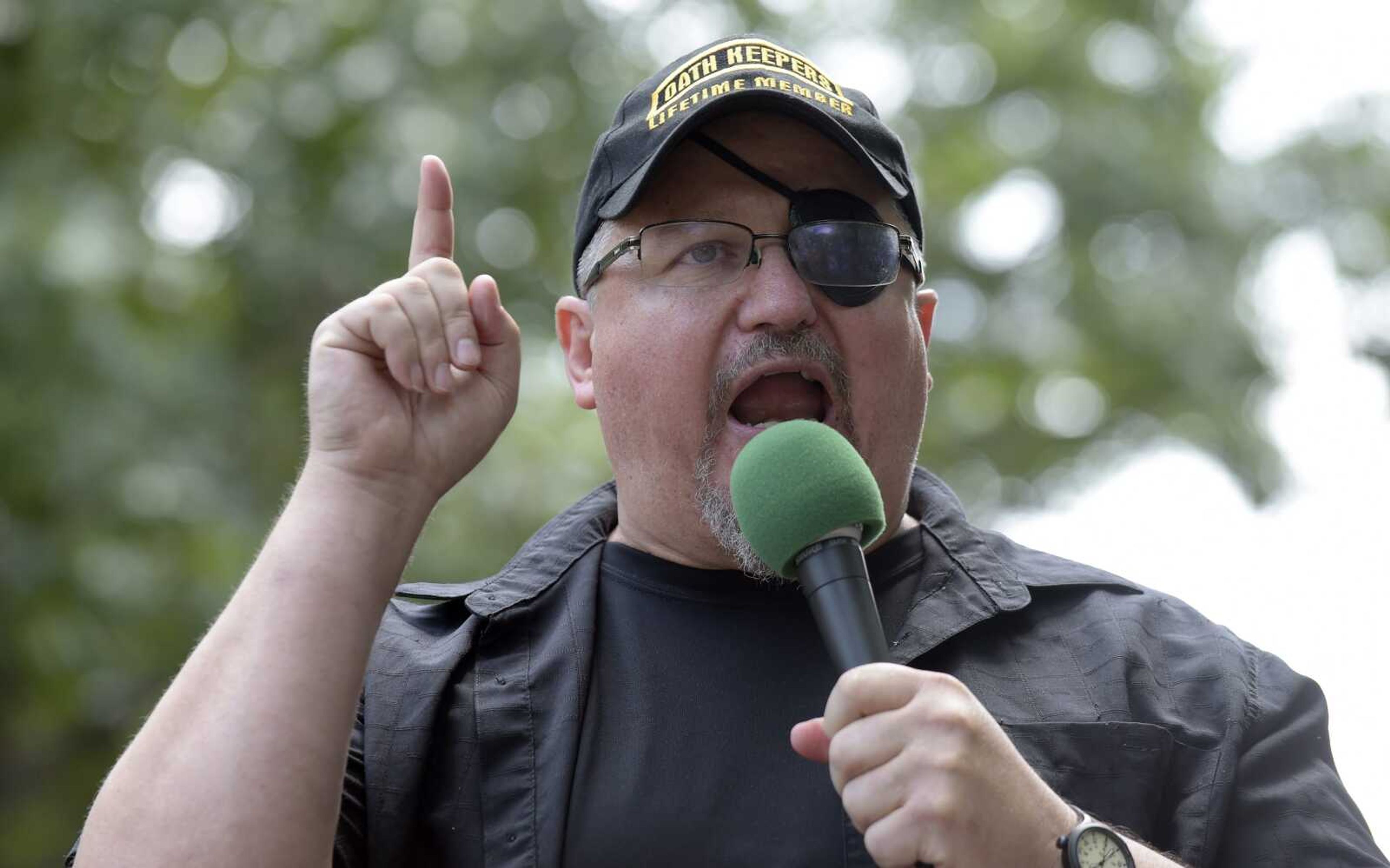 Stewart Rhodes, founder of the Oath Keepers, speaks during a rally outside the White House on june 25, 2017, in Washington.