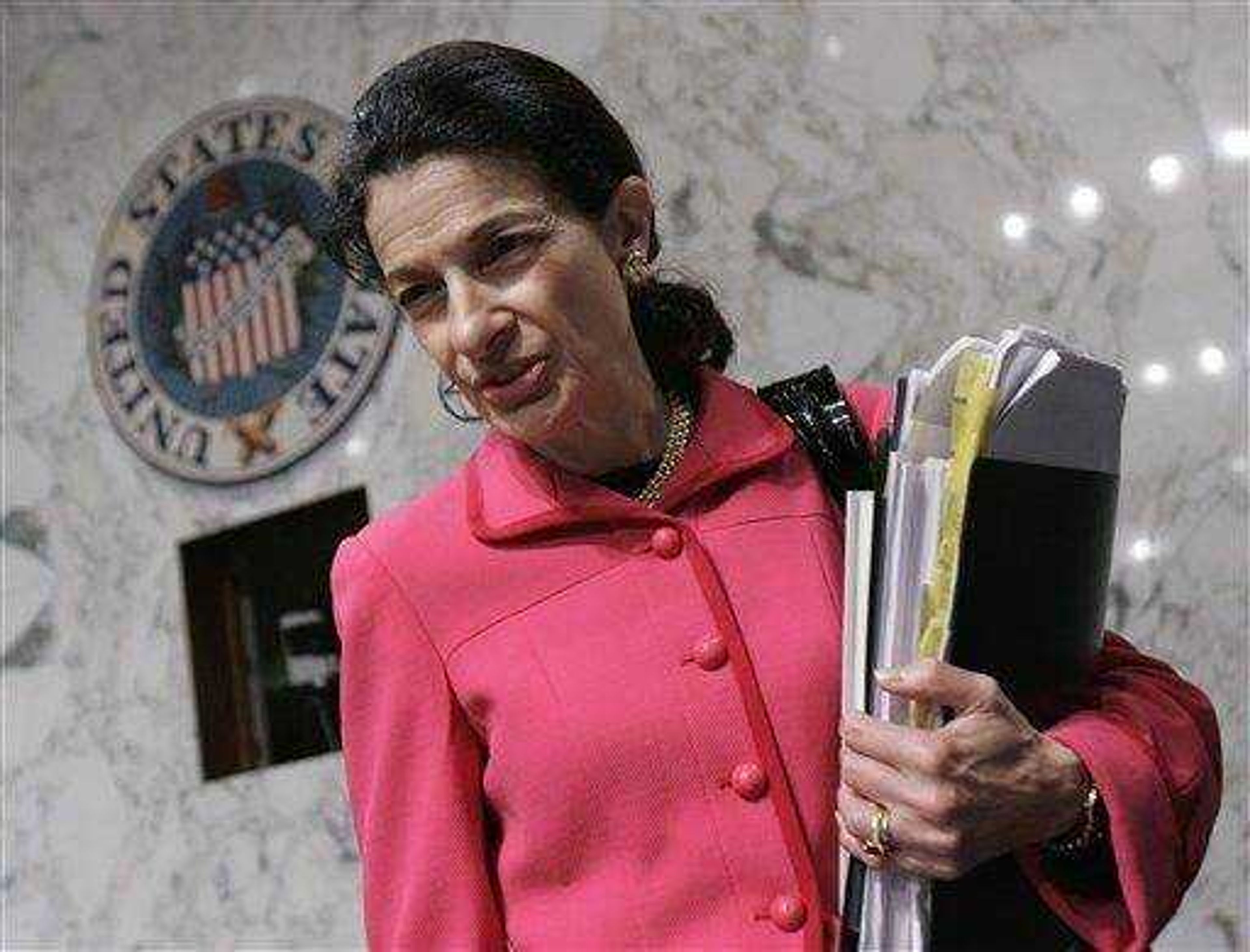 In a Sept. 25 file photo Senate Finance Committee member Sen. Olympia Snowe, R-Maine, arrives on Capitol Hill in Washington. The Senate Finance Committee is poised to approve sweeping legislation today and  a question mark is whether moderate Sen. Olympia Snowe of Maine will become the first Republican to support a health overhaul bill. (AP Photo/Susan Walsh/file)