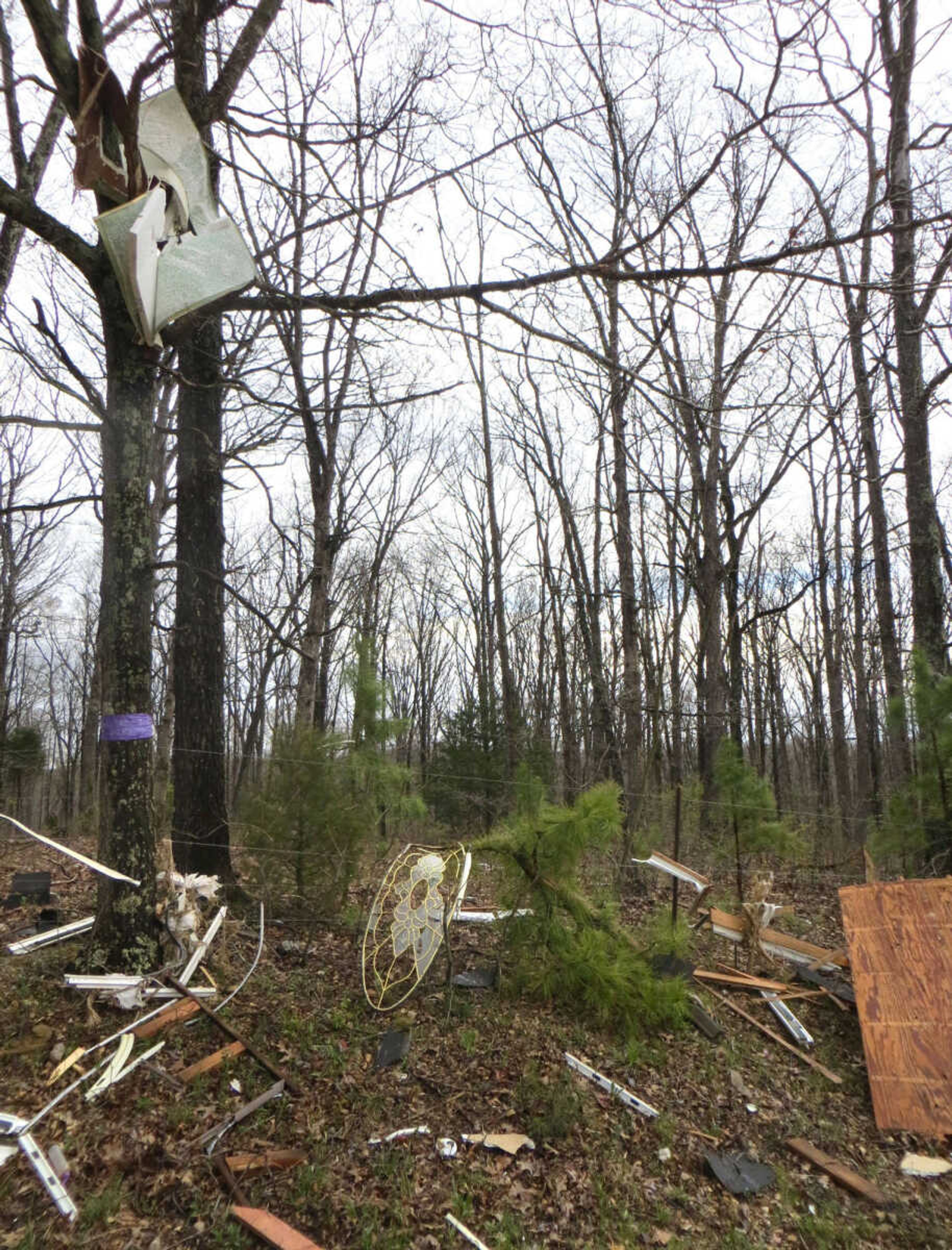 Scattered debris is seen Sunday, April 10, 2016 after an explosion destroyed the Isaac Wittenborn home Saturday night.