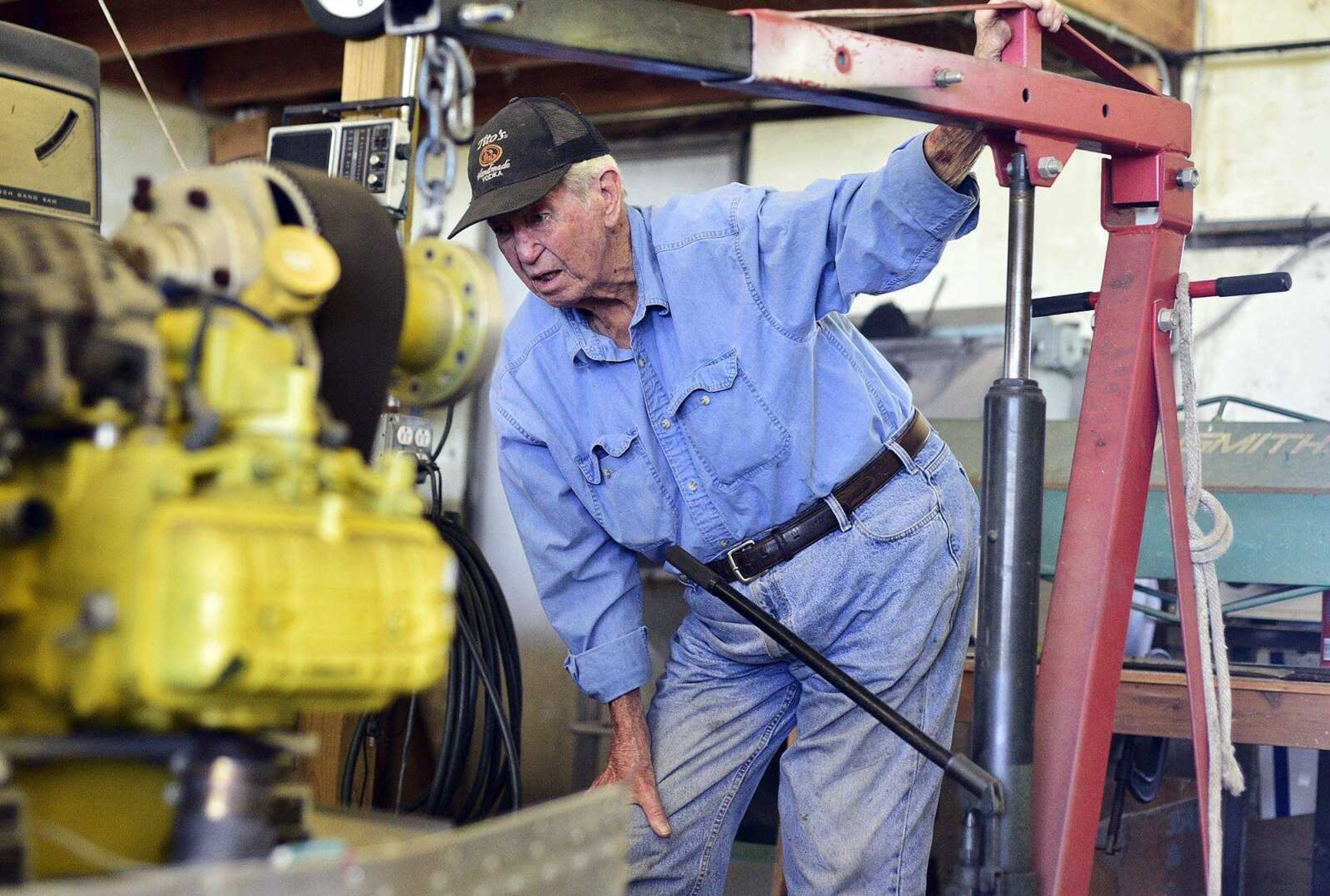 John Farquhar, or known to most as "Papa John" spends most of his days tinkering inside the hangar that houses Cape Copters at the Cape Girardeau Regional Airport.