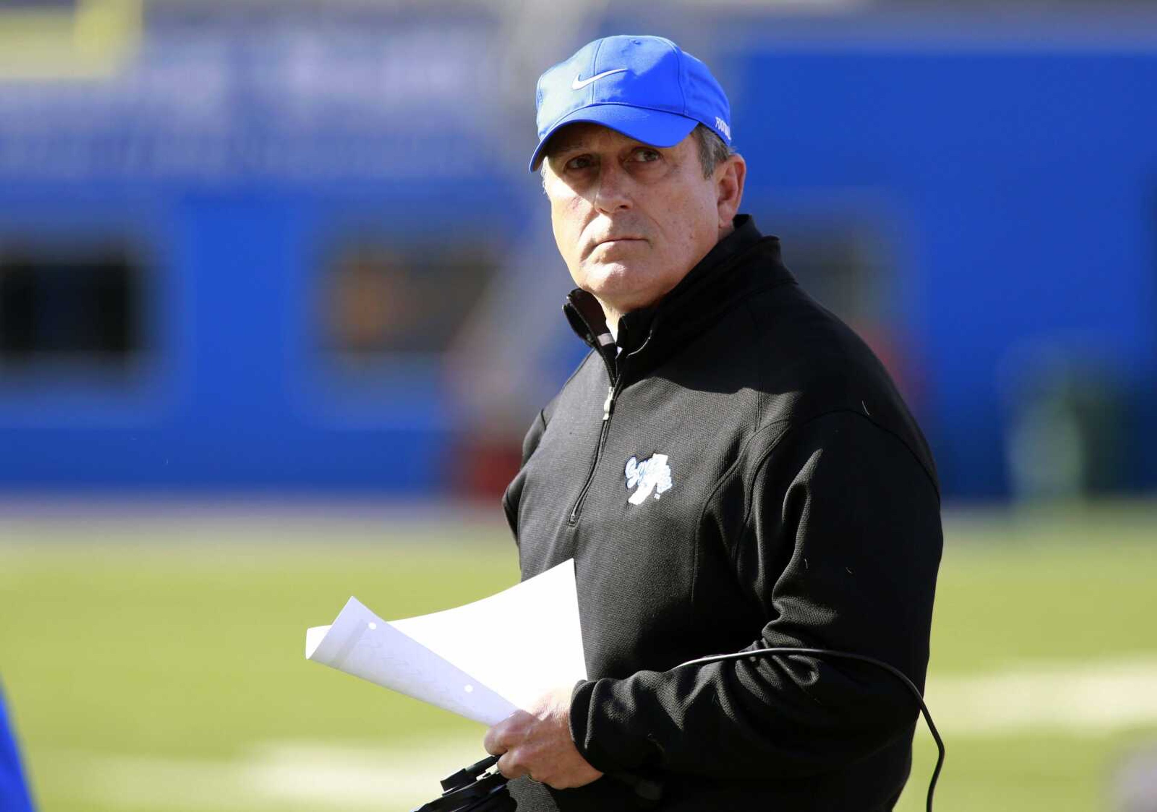 Indiana State head coach Mike Sanford watches the clock during the first half of an NCAA college football game against North Dakota State in Terre Haute, Ind., Saturday, Oct. 26, 2013. (AP Photo/Brent Smith)