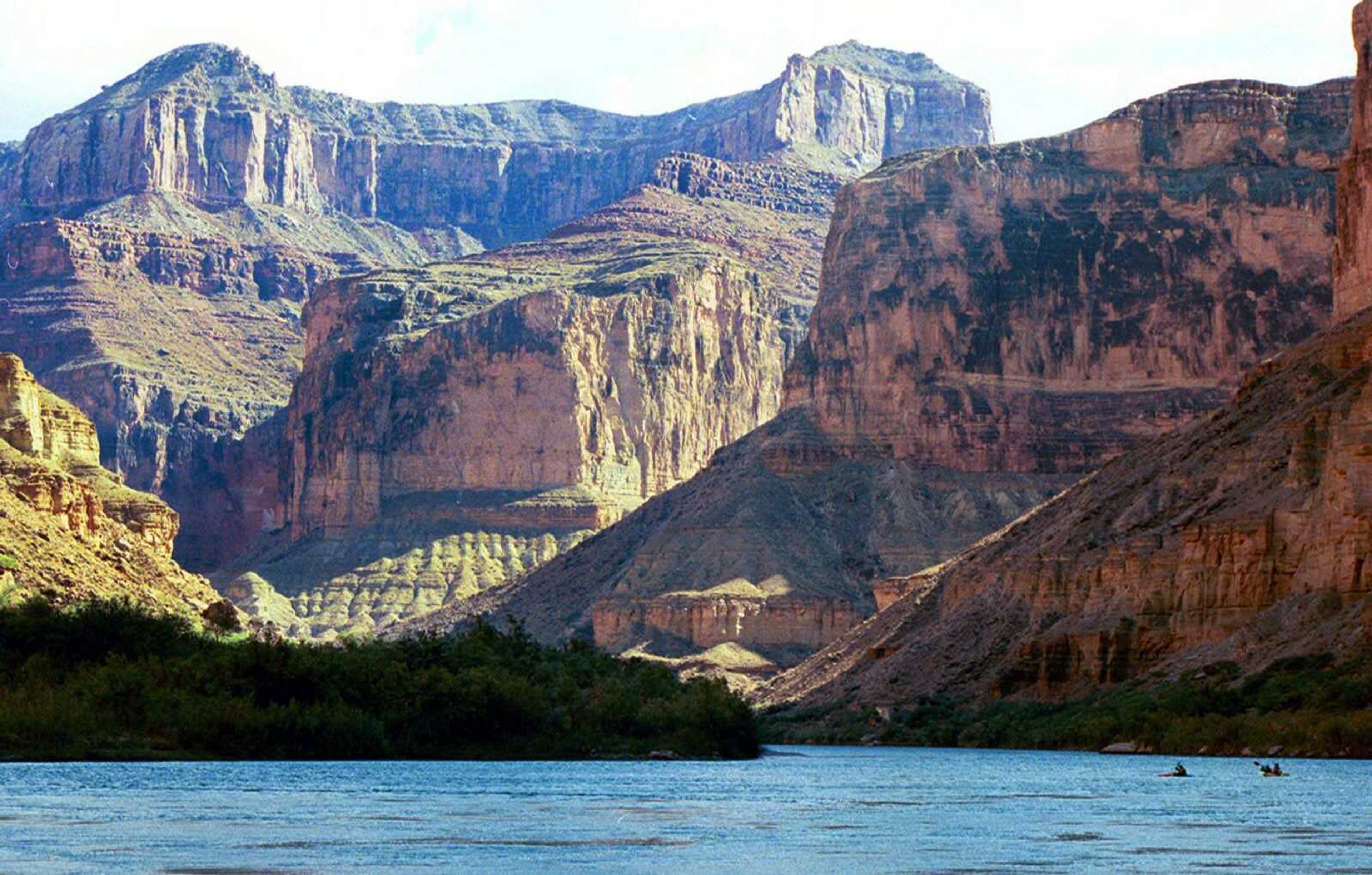 The Colorado River is seen at the Grand Canyon National Park in Arizona. A new report by a federal watchdog outlines a history of sexual harassment on river-rafting trips run by Grand Canyon National Park. (Brian Witte ~ Associated Press)