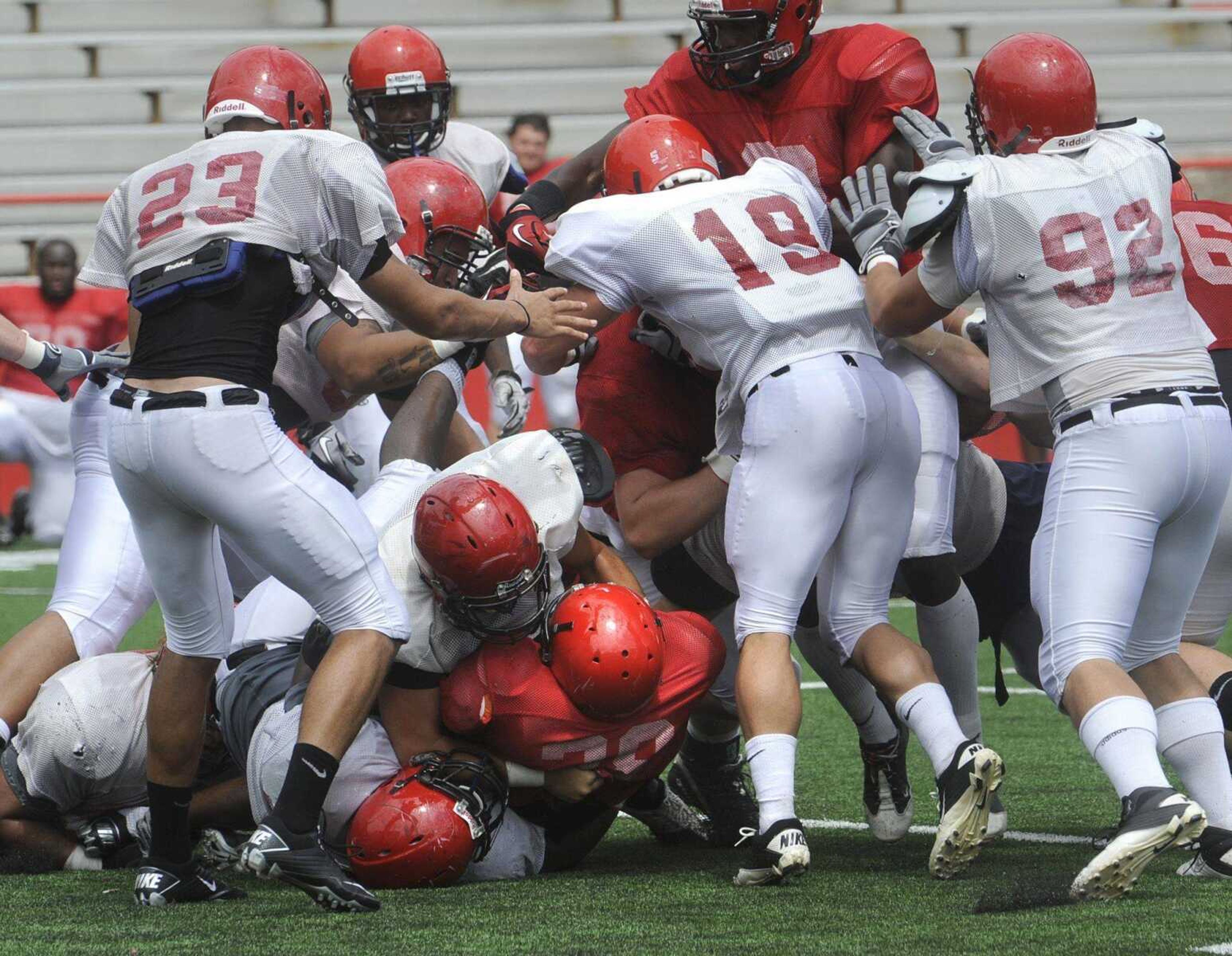 The Southeast Missouri State defense tackles running back Renard Celestin during Saturday's scrimmage.