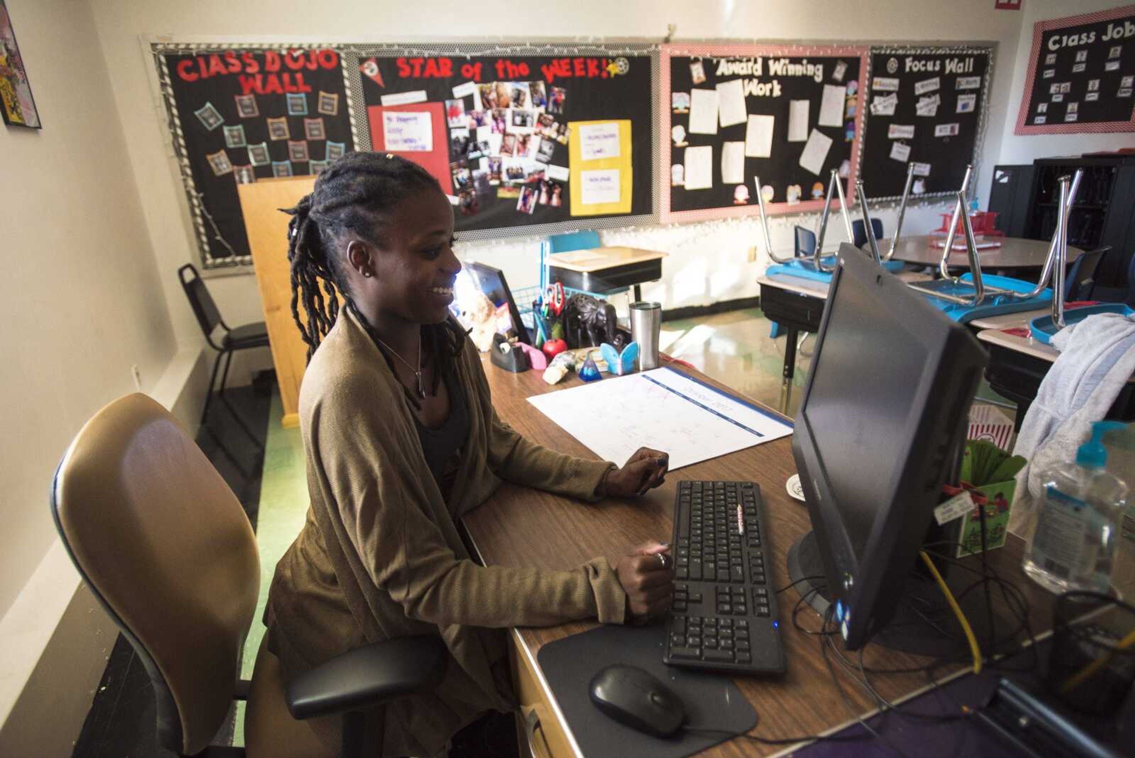 Andrea Cox a fourth grade teacher at Jefferson Elementary sits at her desk Thursday, Oct. 19, 2017 in Cape Girardeau. Ms. Cox has a passion for technology and throughout the year teaches her students coding when she can. She said she thinks it is important to keep the kids updated on technology to prepare them as they get older.