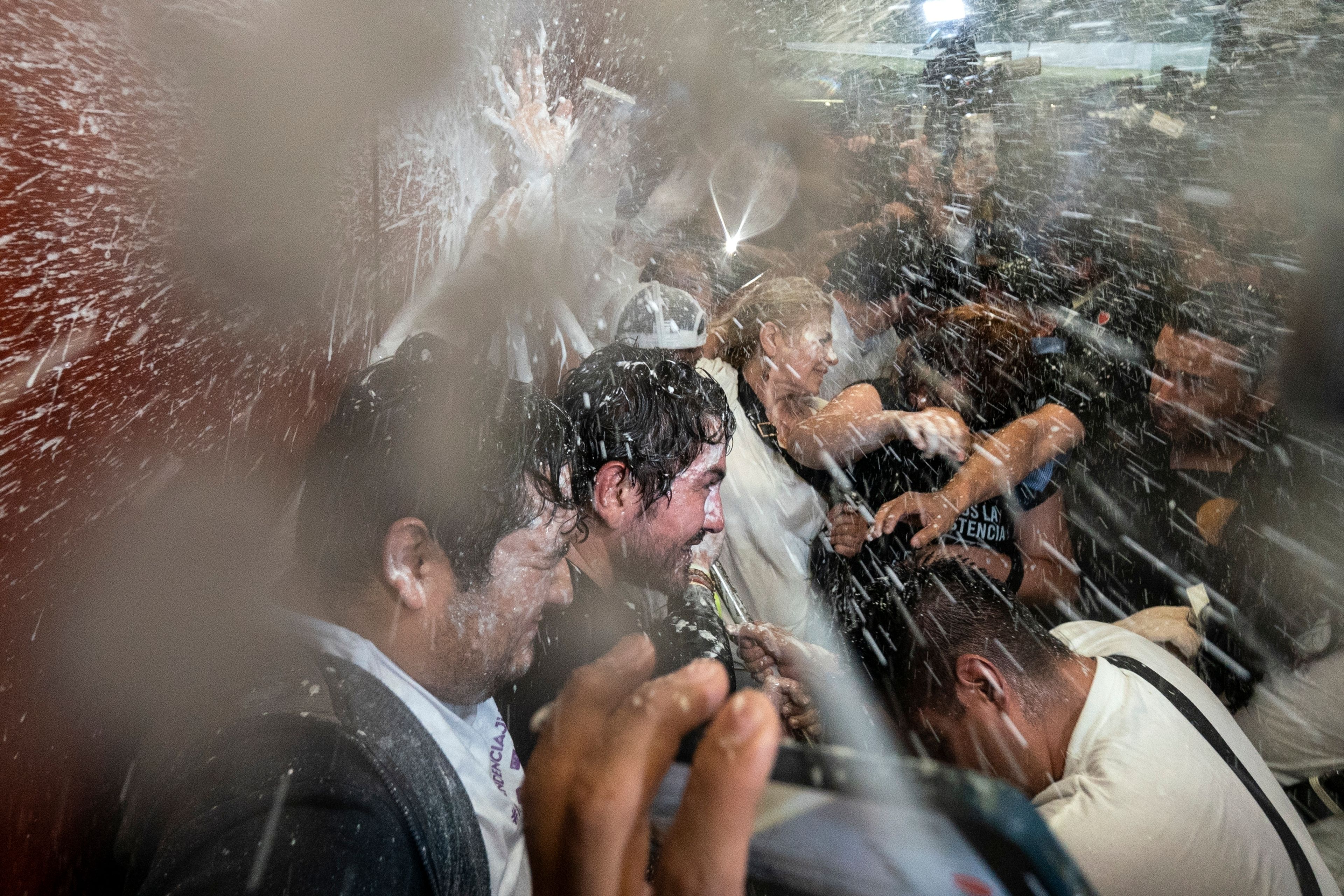 Protesters break into a Senate session in which lawmakers were debating the government's proposed judicial reform, which would make judges stand for election, in Mexico City, Tuesday, Sept. 10, 2024. (AP Photo/Felix Marquez)