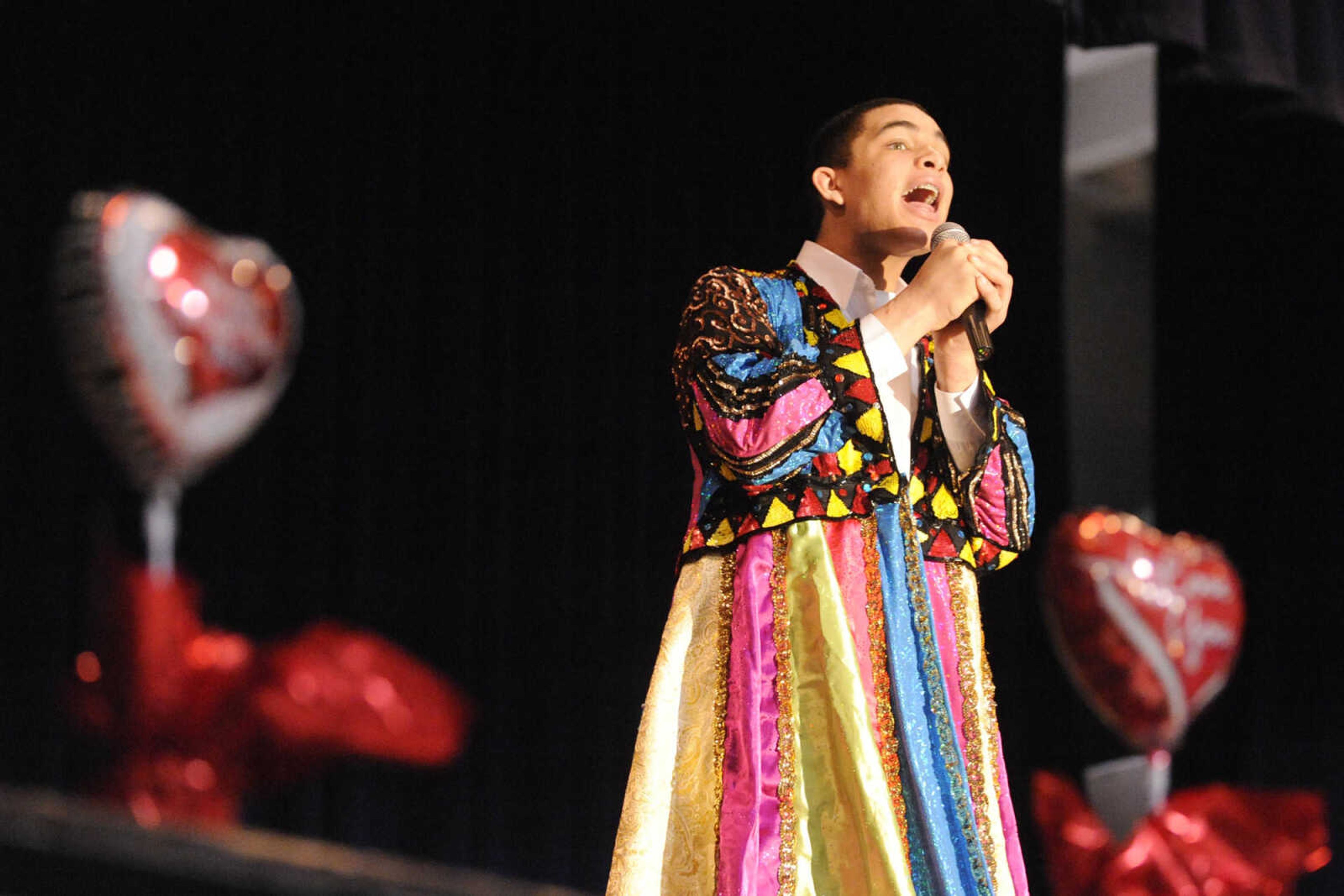 GLENN LANDBERG ~ glandberg@semissourian.com

Isaiah Sterling performs a song from Joseph and the Amazing Technicolor Dreamcoat during the Valentine's Party sponsored by Schnucks Supermarket for couples who have been married for 50 or more years at the Arena Building Friday, Feb. 13, 2015.