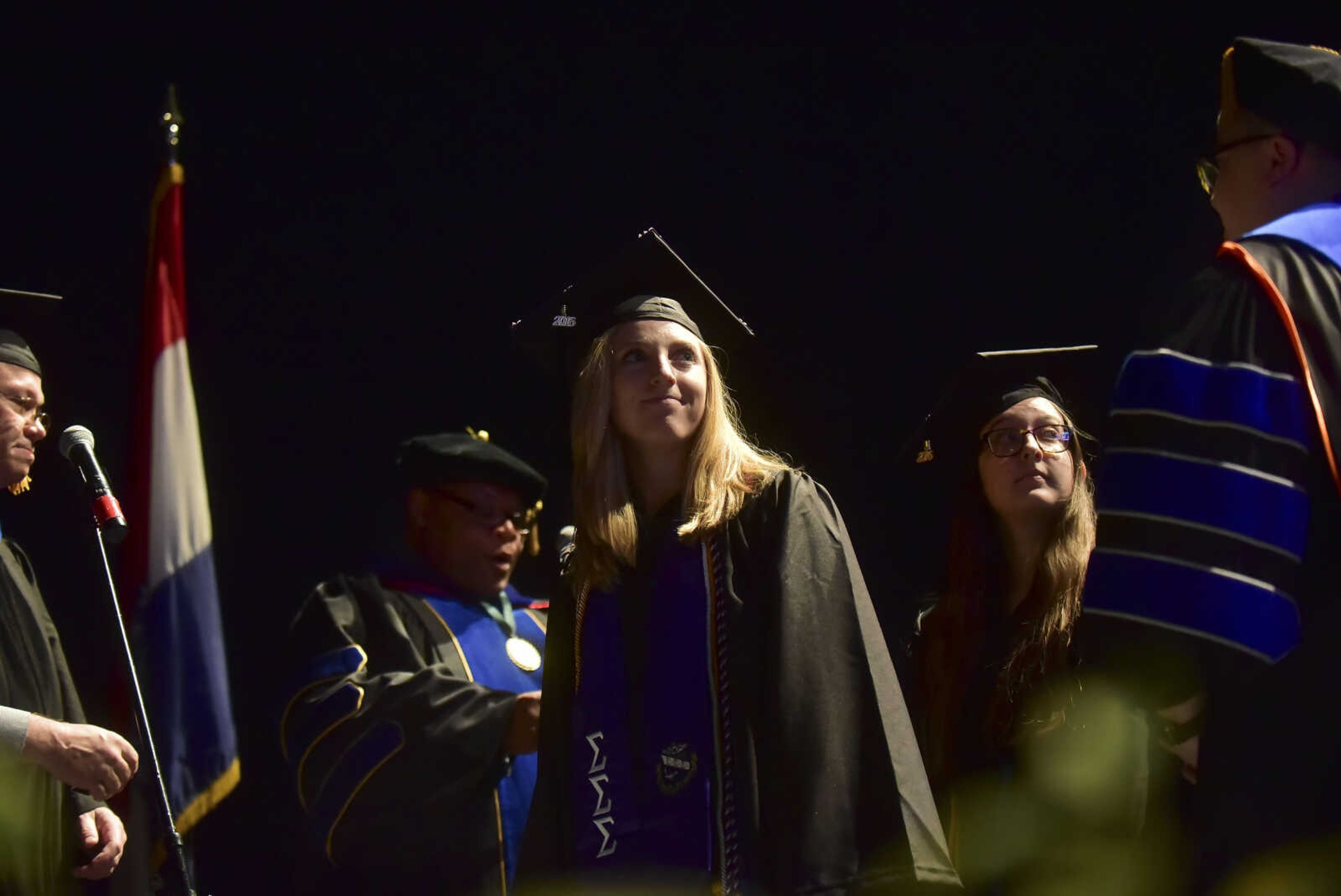 ANDREW J. WHITAKER ~ awhitaker@semissourian.com
Students walk on stage during Southeast Missouri State University graduation Saturday, Dec. 17, 2016 at the Show Me Center in Cape Girardeau.