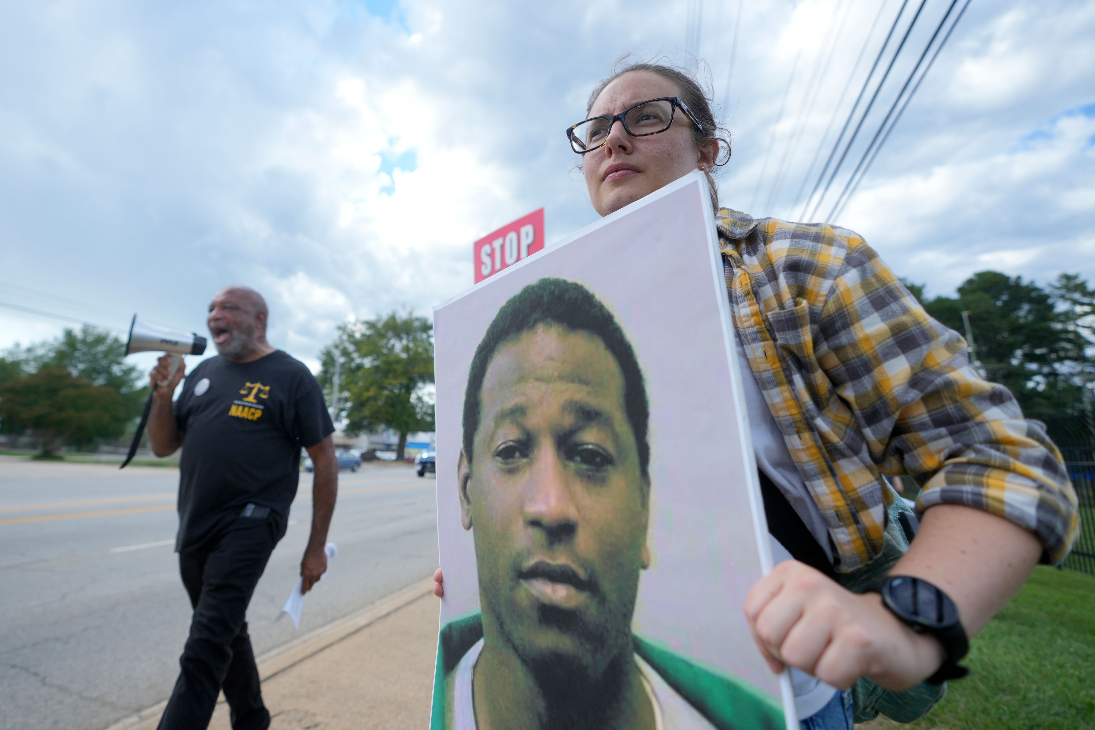 Rev. Hillary Taylor protests the planned execution of Freddie Eugene Owens, 46, on Friday, Sept. 20, 2024, in Columbia, S.C. Owens is set to be the first person to be executed in South Carolina in 13 years. (AP Photo/Chris Carlson)