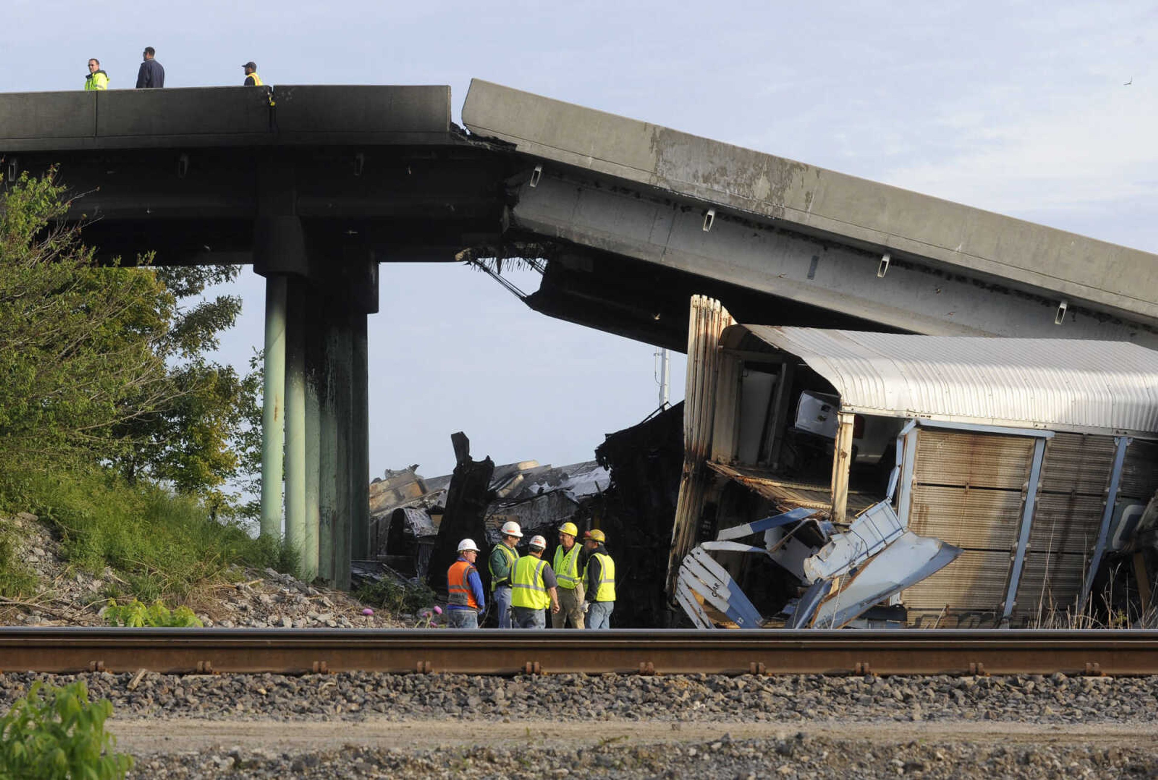 The Route M overpass at Rockview, Mo., collapsed onto railroad tracks after a westbound Union Pacific train T-boned a southbound Burlington Northern Santa Fe train Saturday morning. (Fred Lynch)