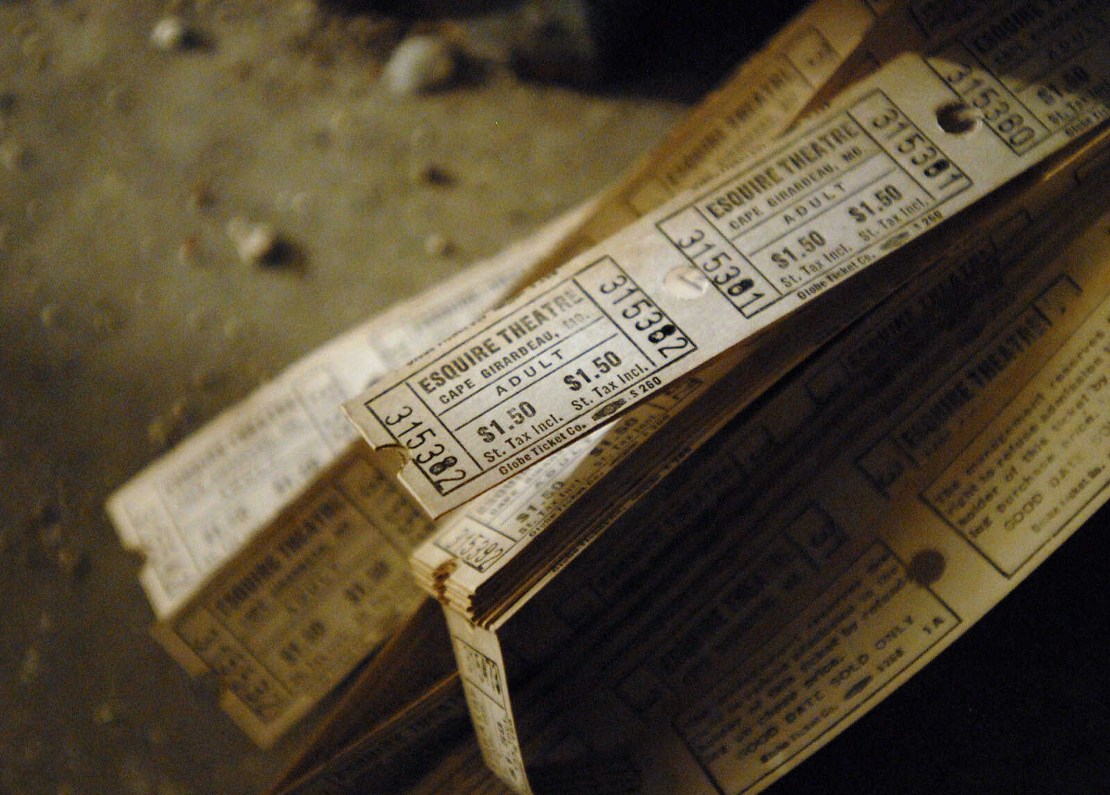 KRISTIN EBERTS ~ keberts@semissourian.com

Old tickets are found in the projection room of the Esquire Theater building on Friday, Jan. 6, 2012, in Cape Girardeau. Renovation work on the Esquire Theater continues as workers from Kiku Obata & Company and Penzel Construction complete field verification work and take measurements necessary for the design plans.