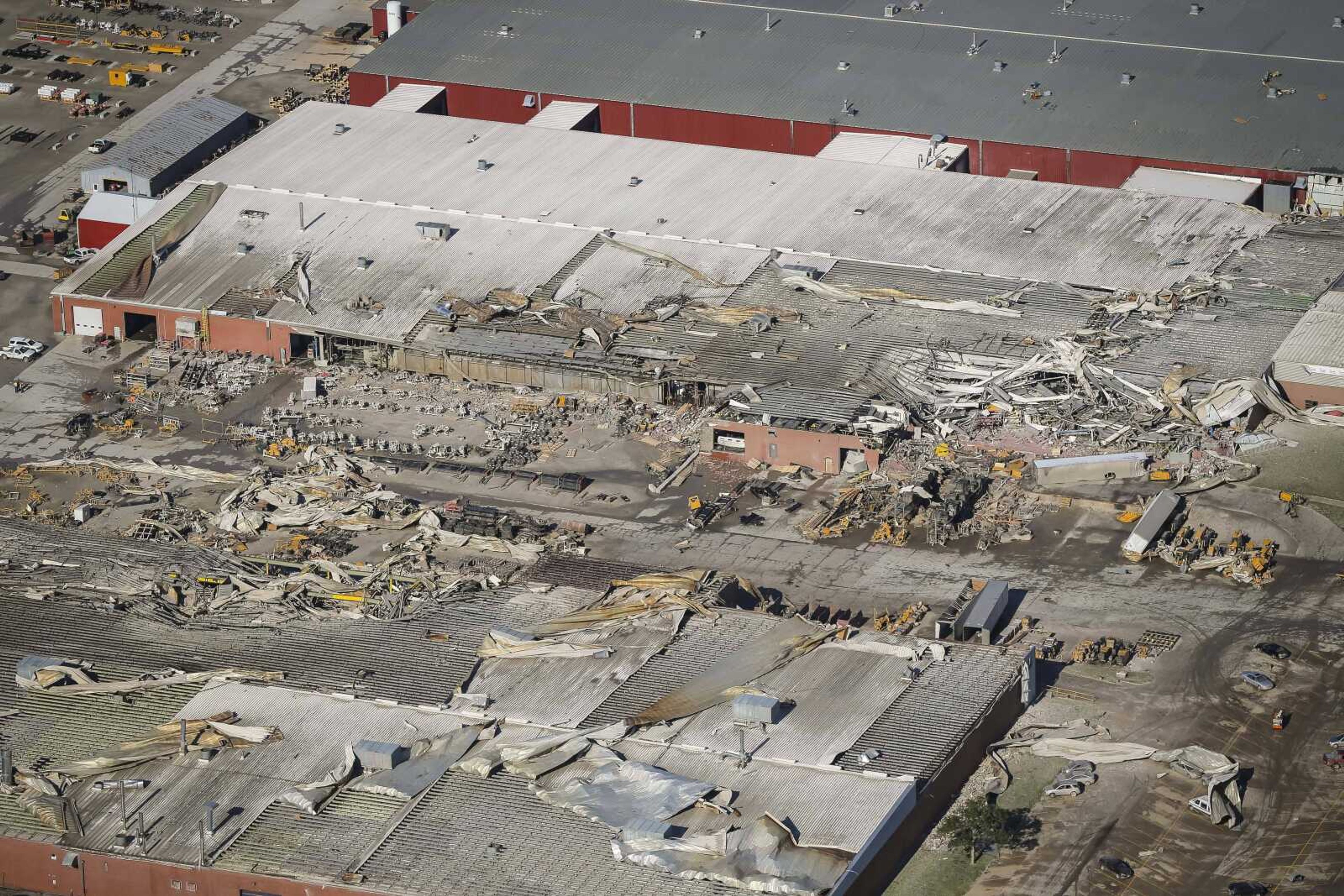 Damage to production plants at Vermeer Corp., a farm and construction equipment manufacturer in Pella, Iowa, is seen Thursday after a tornado went through the area.